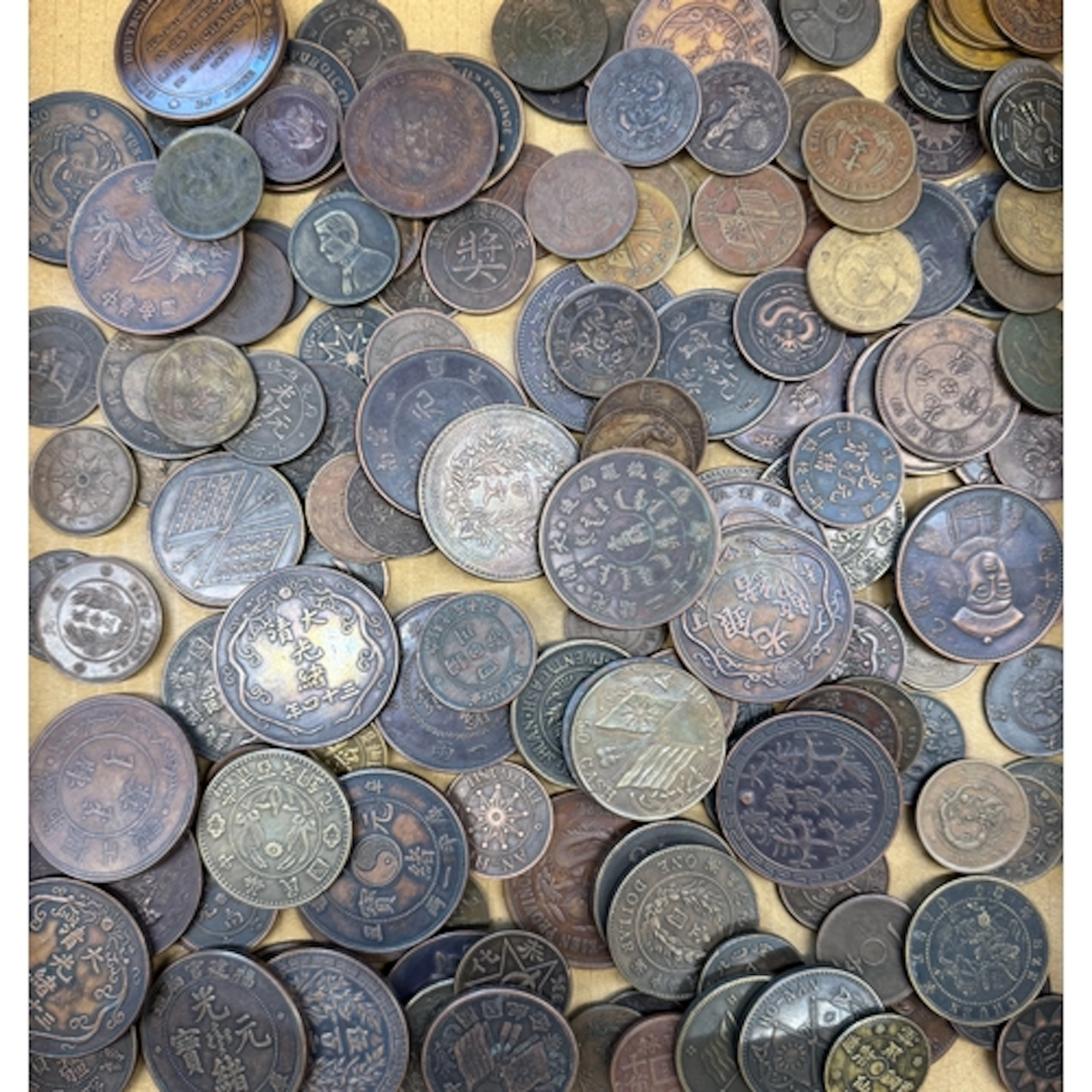 A large collection of approximately 157 Chinese copper and b...