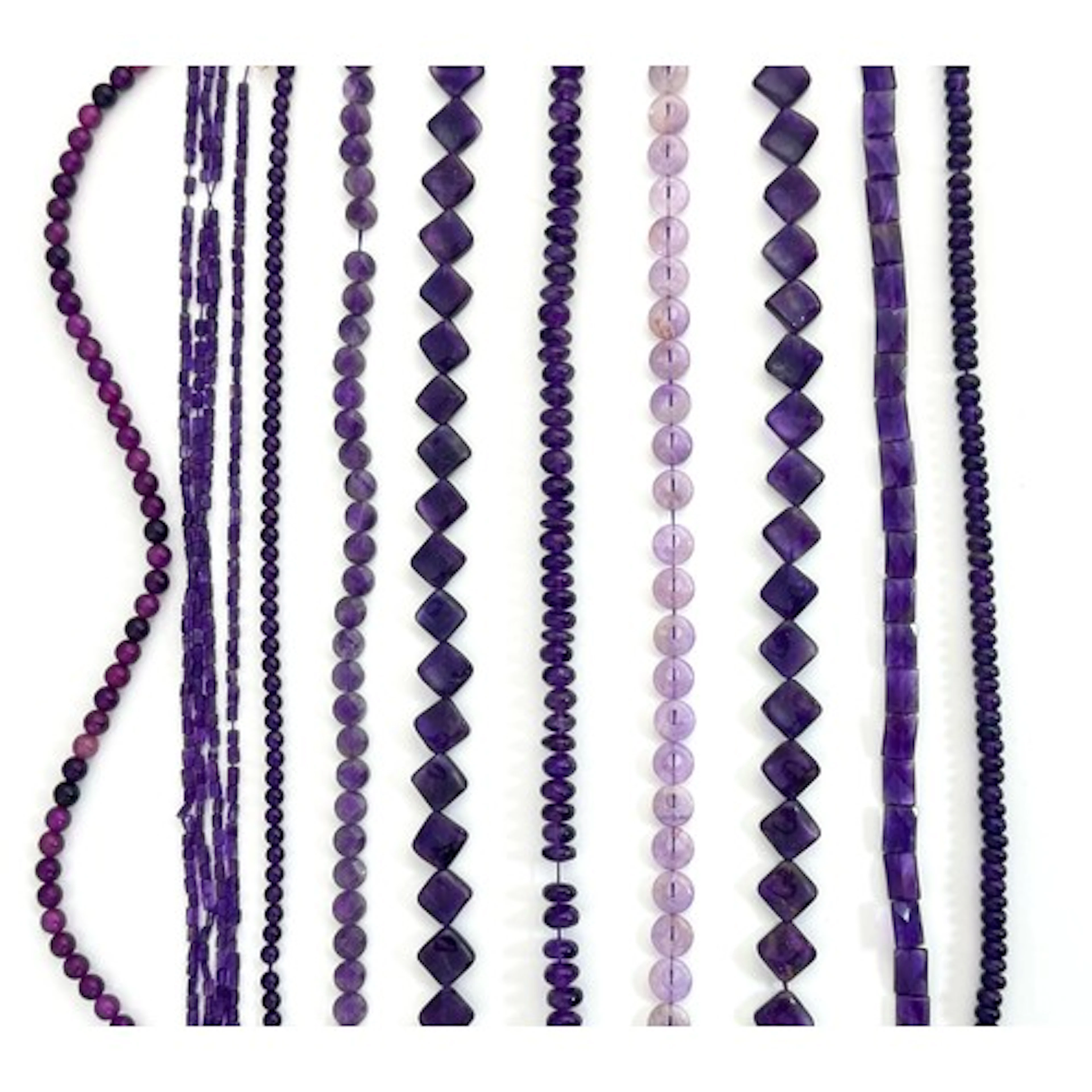 Several strings of polished amethyst beads, various shapes i...