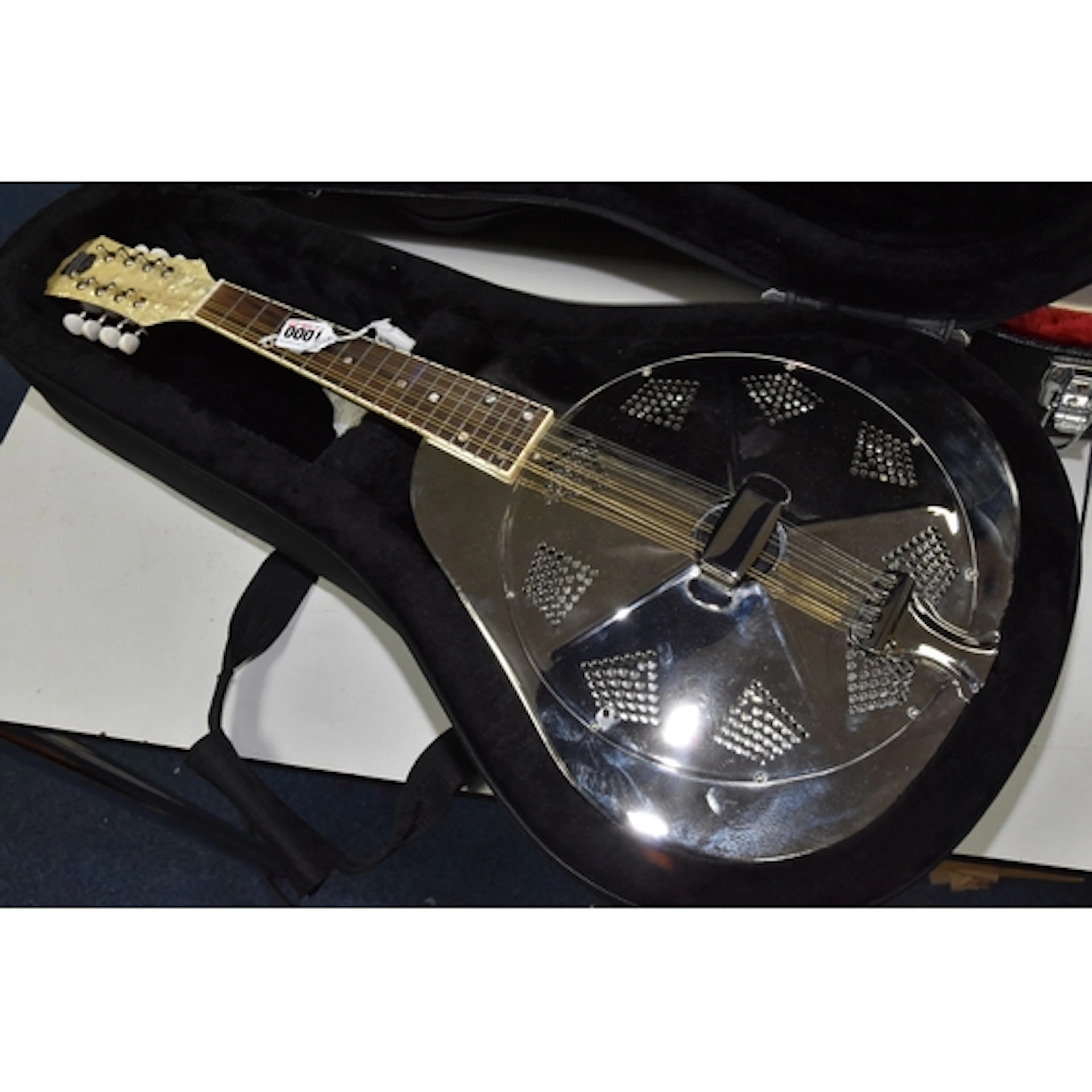 A RECORDING KING EIGHT STRING RESONATOR MANDOLIN, the pear s...