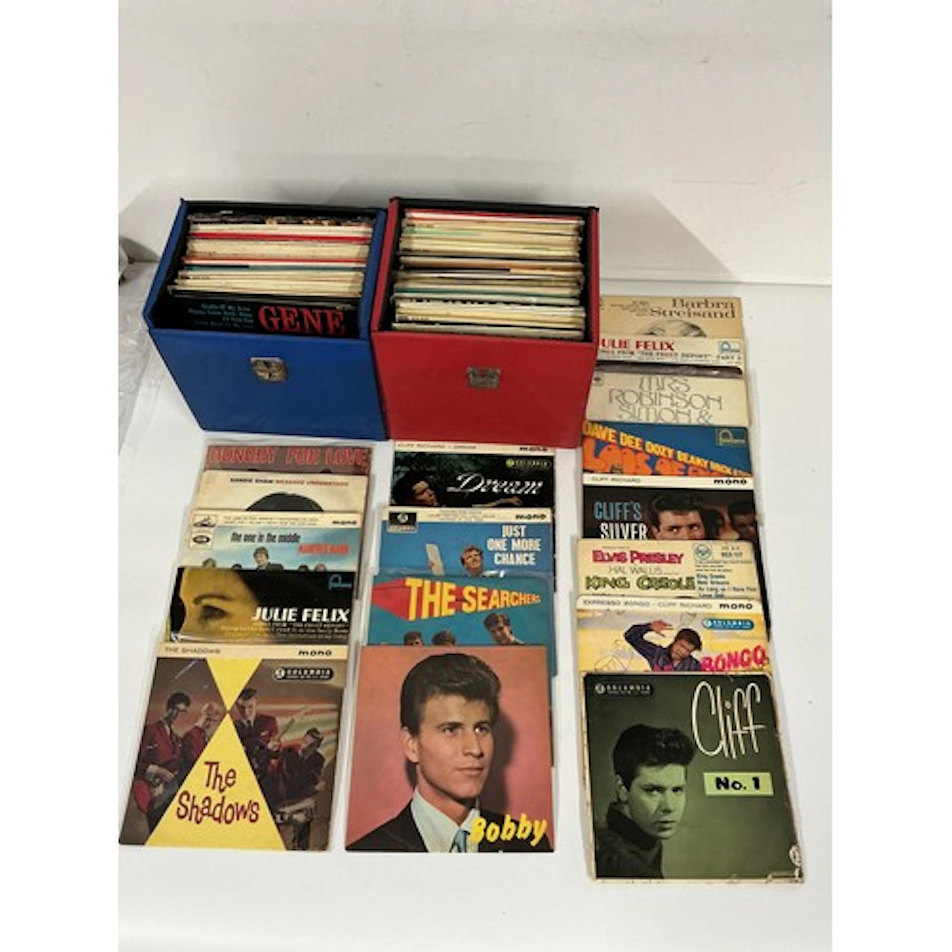 Two records cases of EPs by various artists including Elvis ...