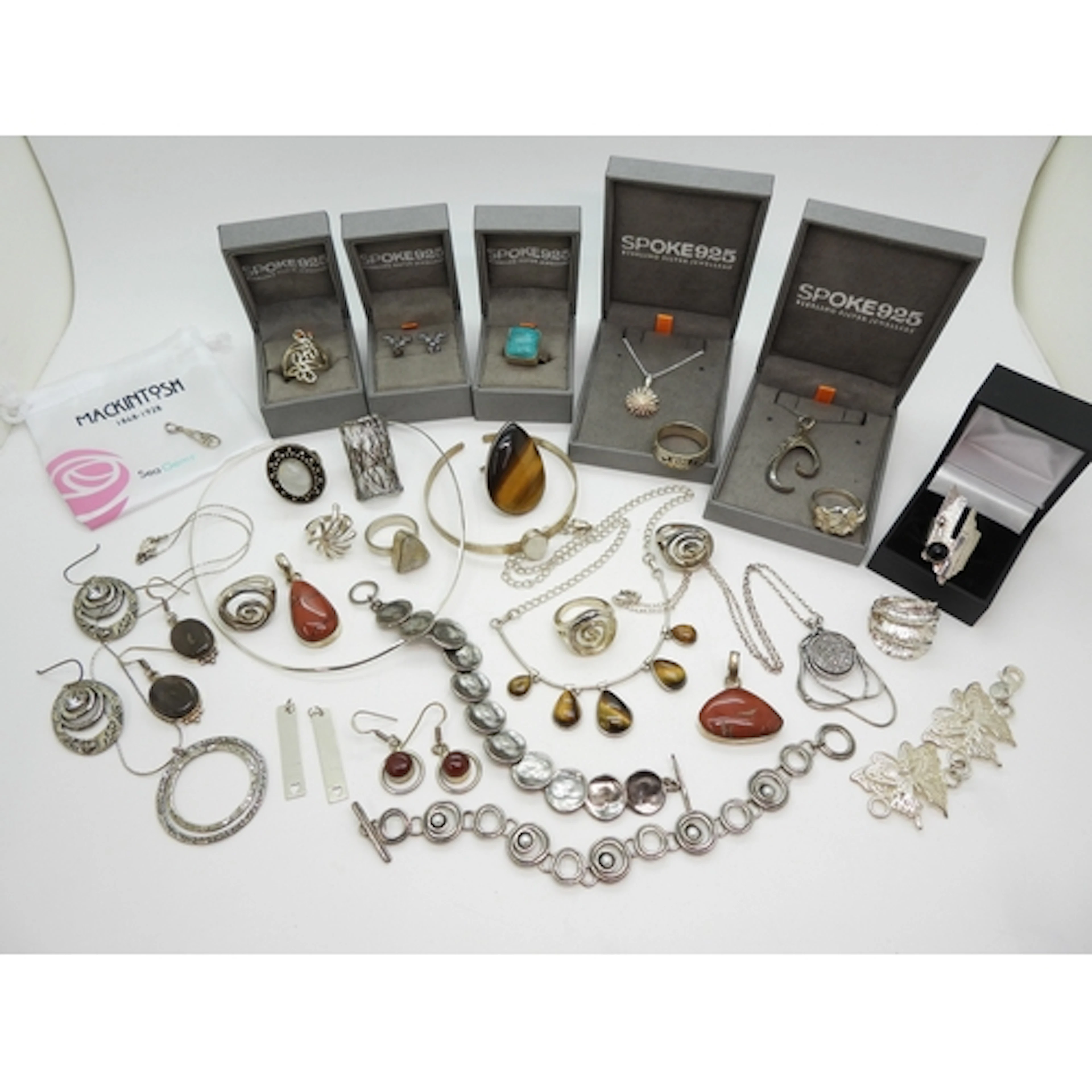 A collection of silver and white metal jewellery to include ...