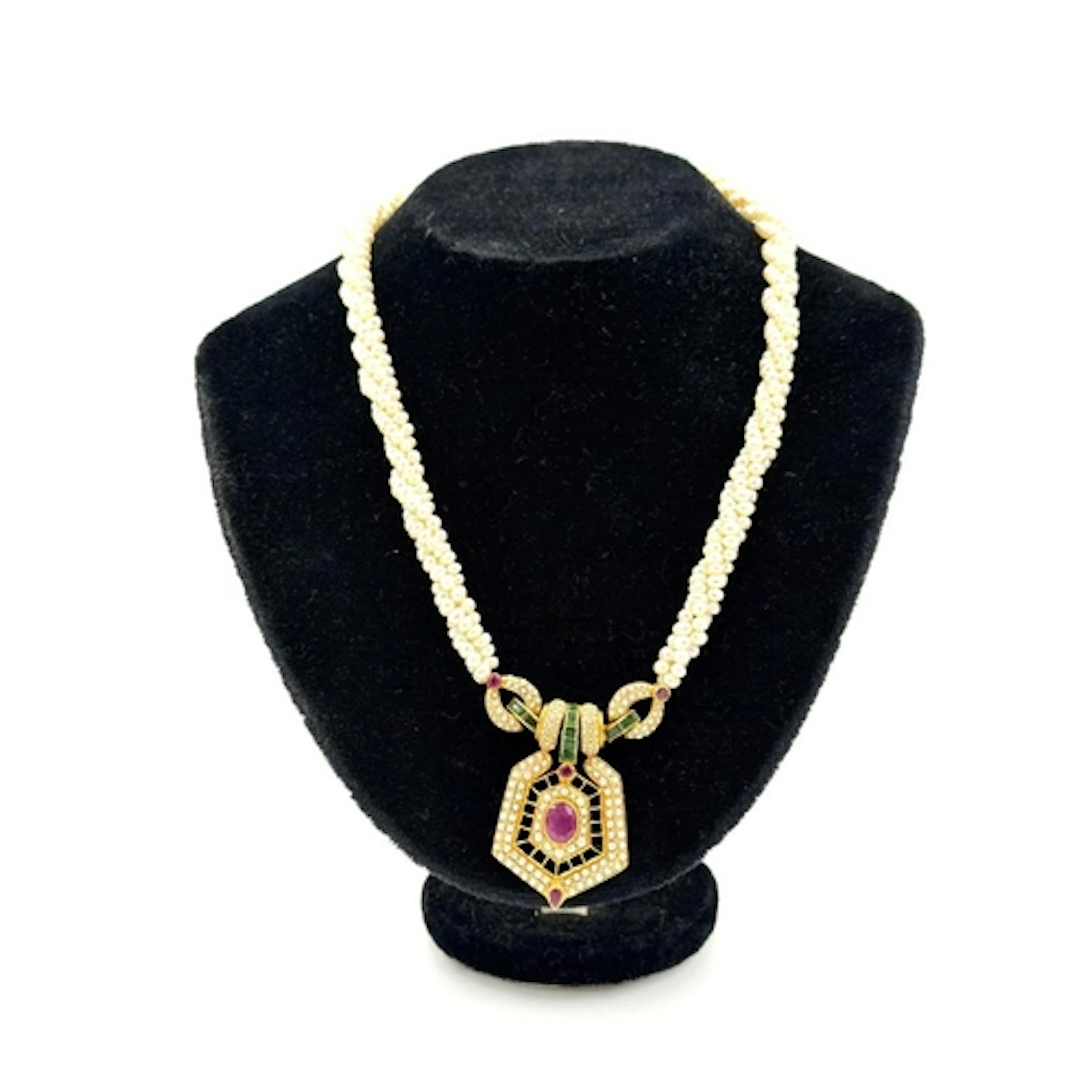 An Arabian hallmarked 916, pendant on knotted pearl necklace...
