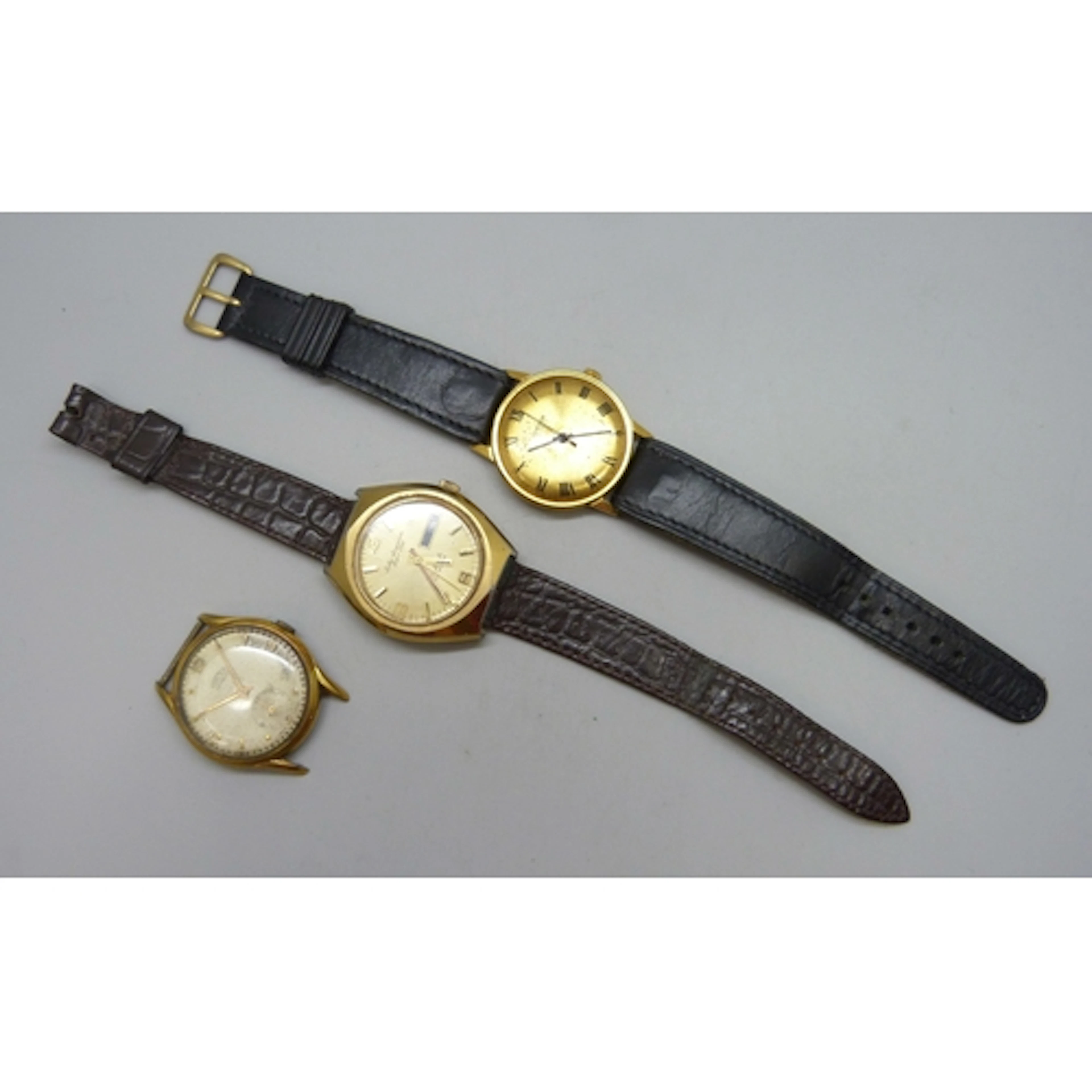 Three wristwatches - Roamer, Sekonda and Jules Jurgensen