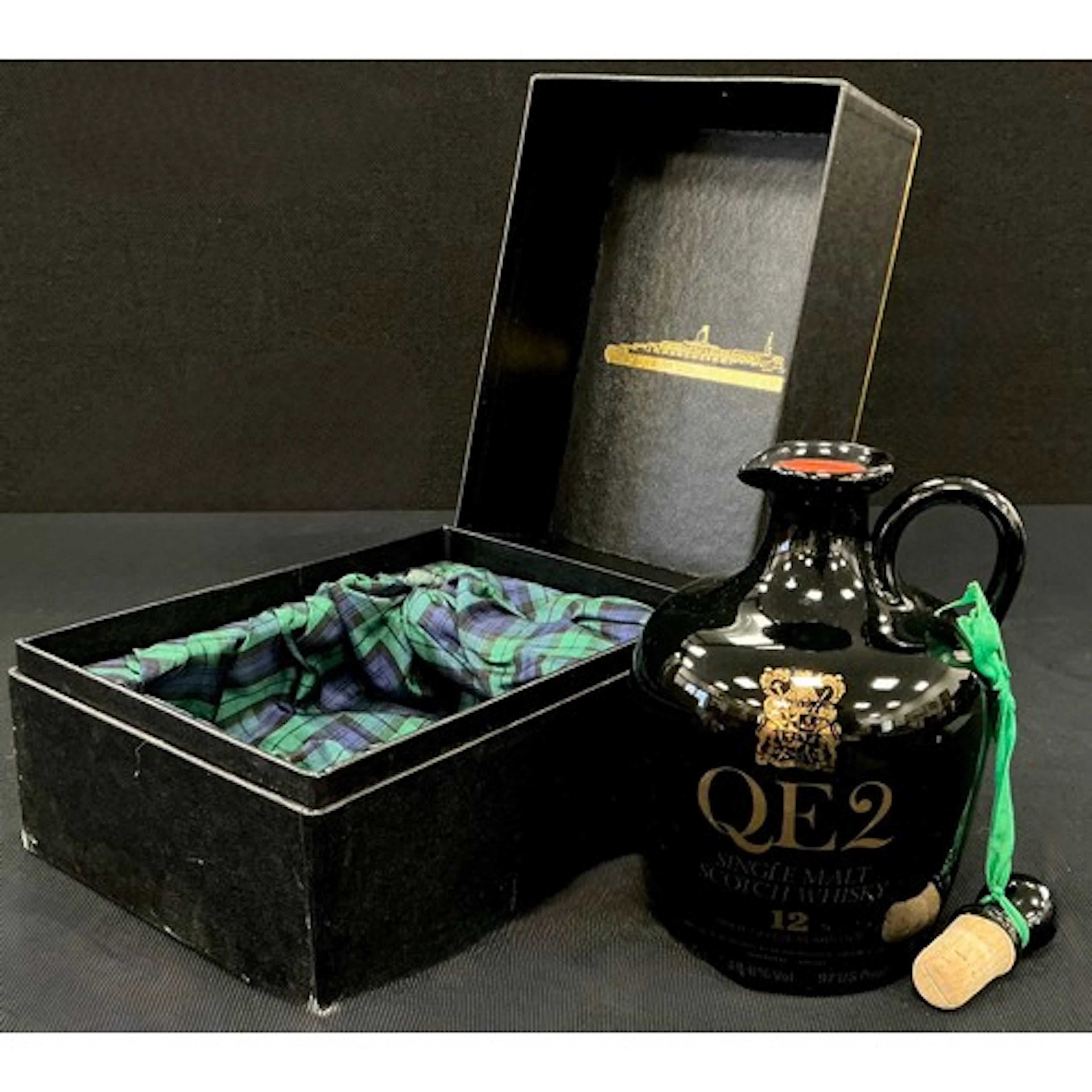 A bottle of QE2 12 year old single malt Scotch whisky presen...