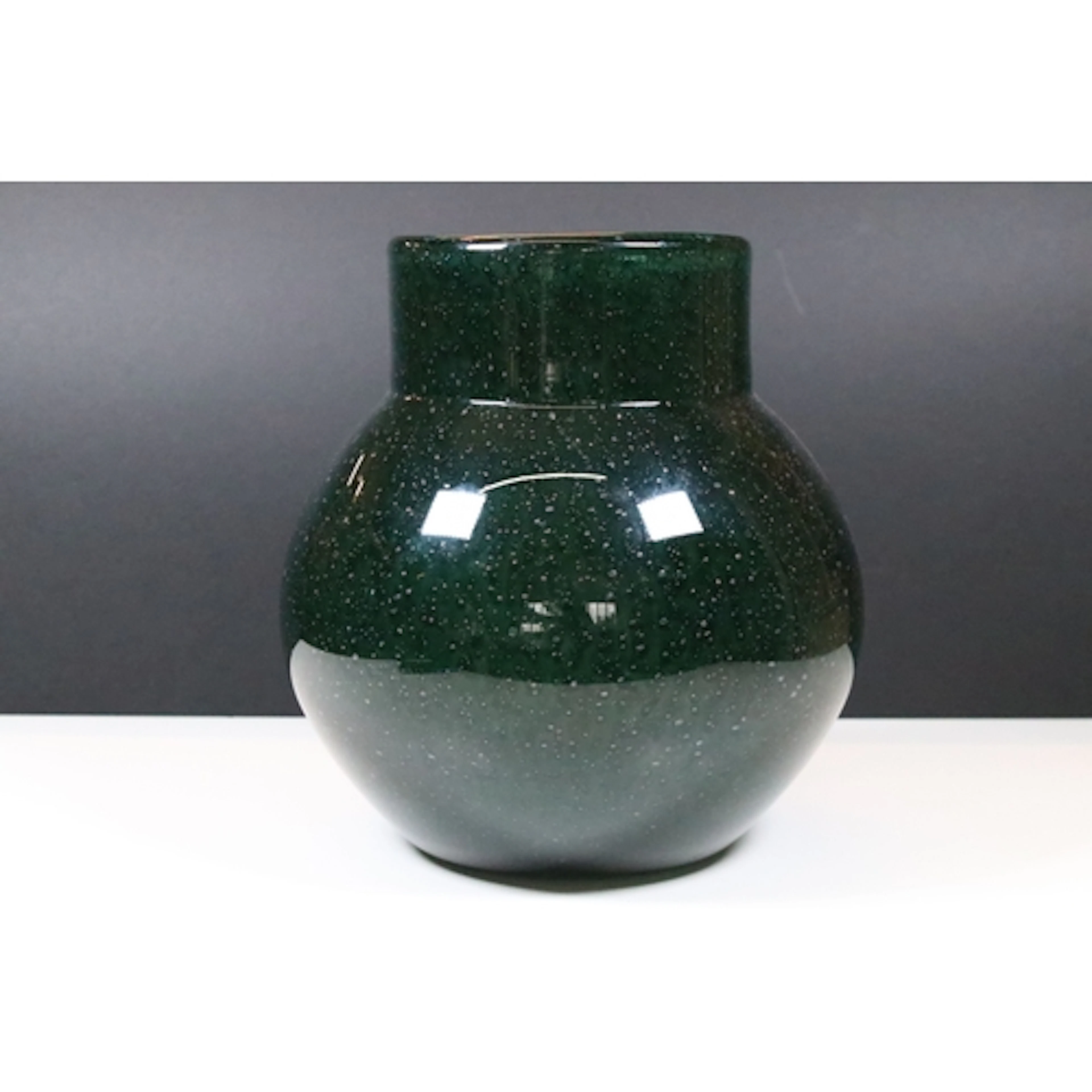 20th century bulbous green art glass vase, having controlled...