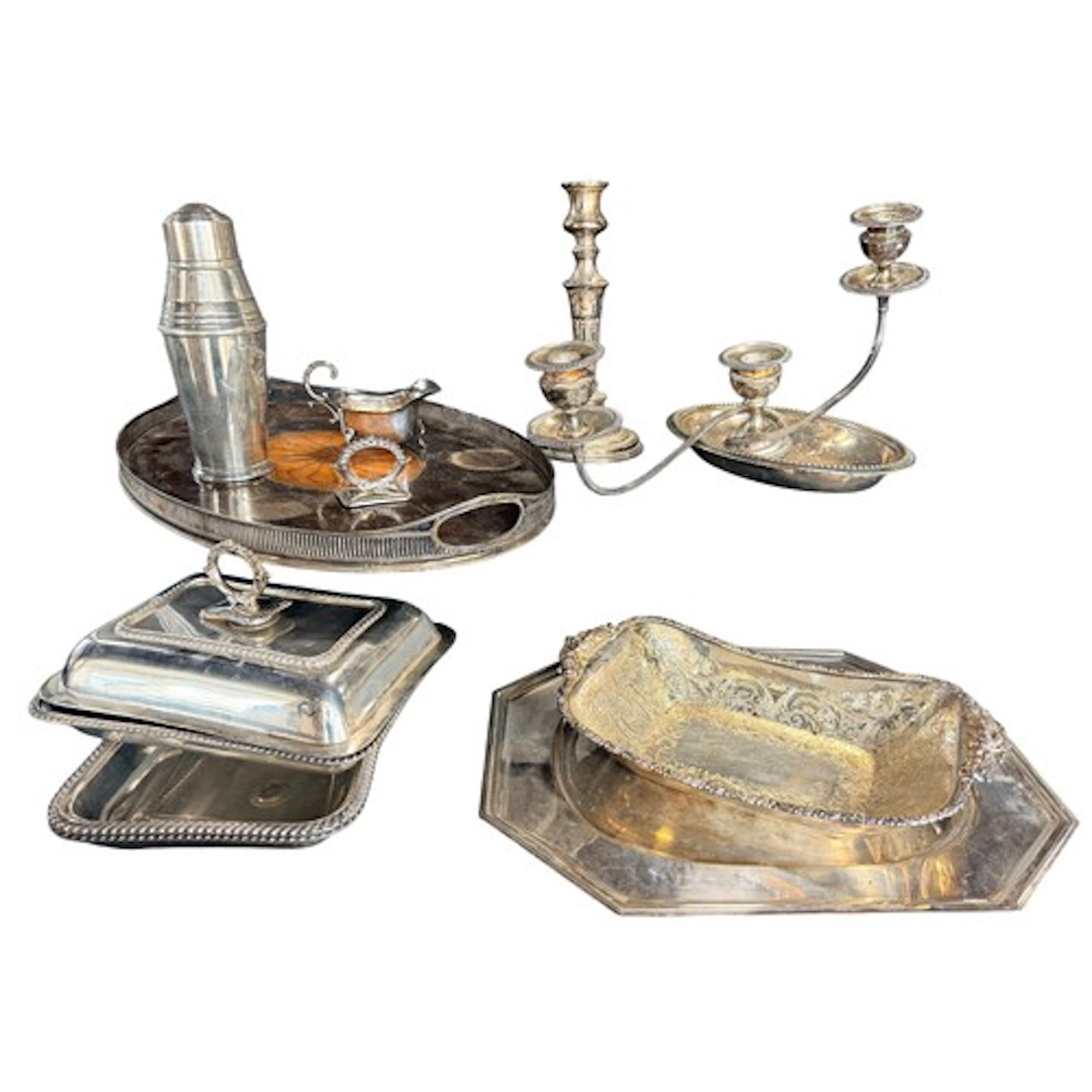 A collection of various silver plated wares to include cande...