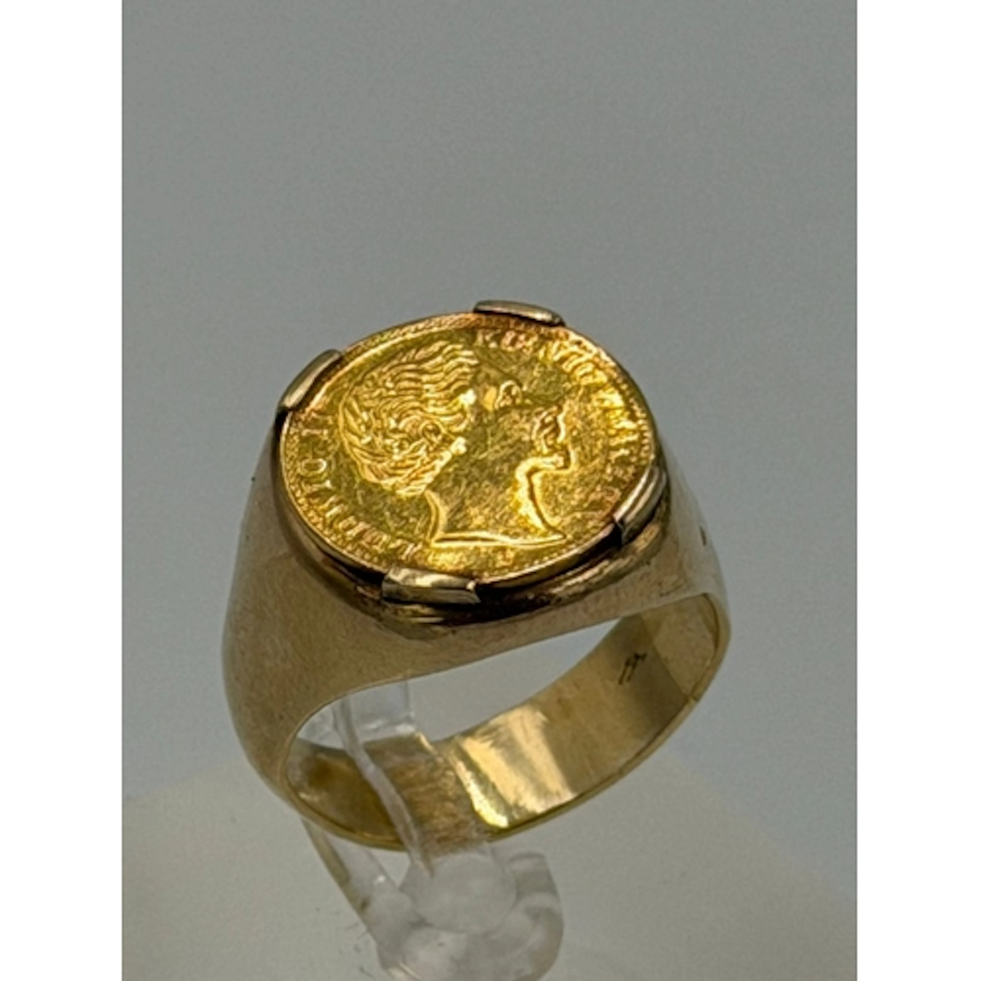A 14ct, marked 585, gold Gents signet ring set with a Bavari...