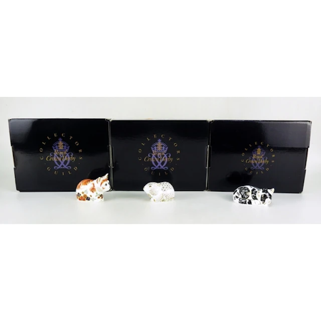 Three Royal Crown Derby Collectors Guild, paperweights inclu...