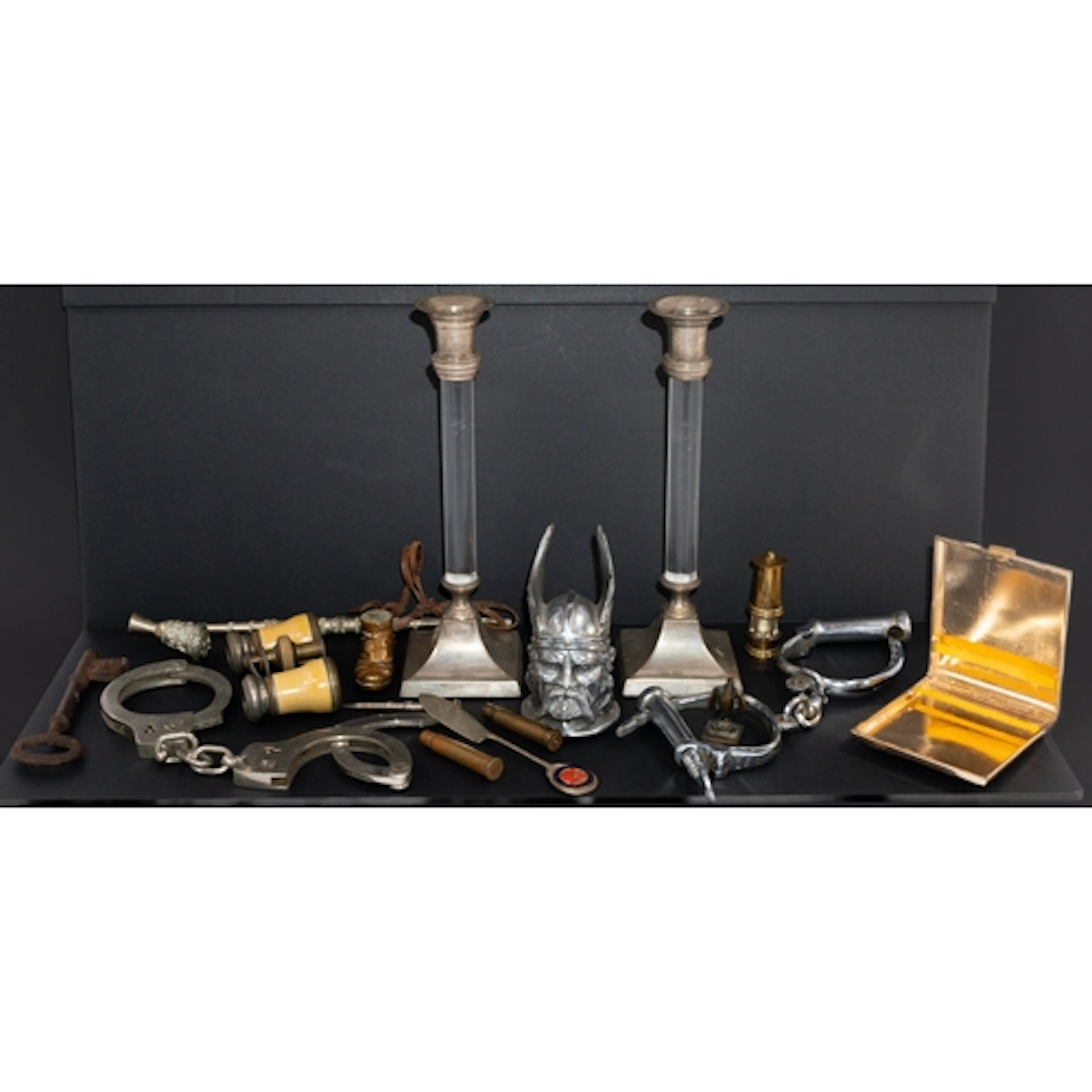Metalware: a pair of perspex and silver plated candlesticks,...