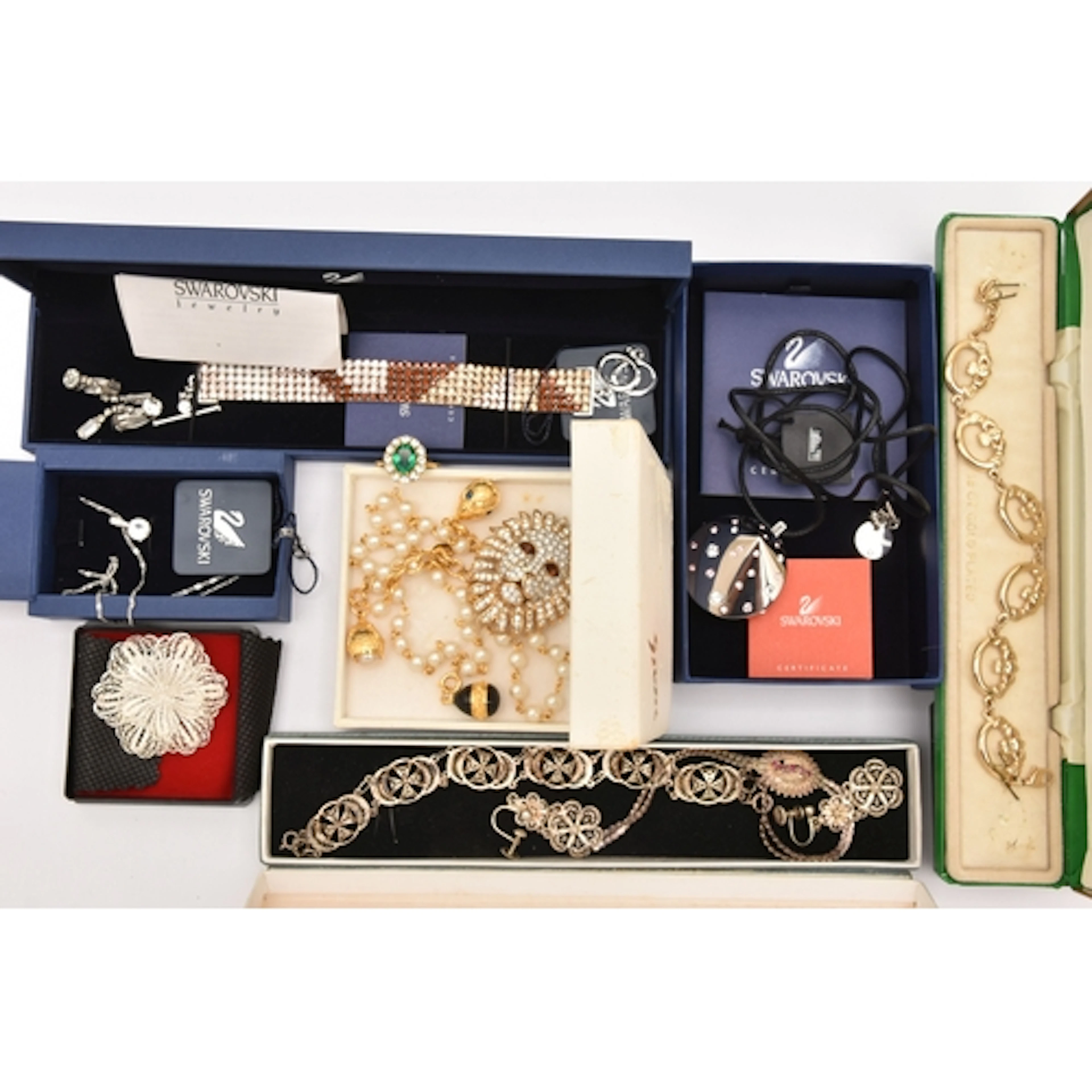 A COLLECTION OF JEWELLERY, to include a boxed 'Swarovski' br...