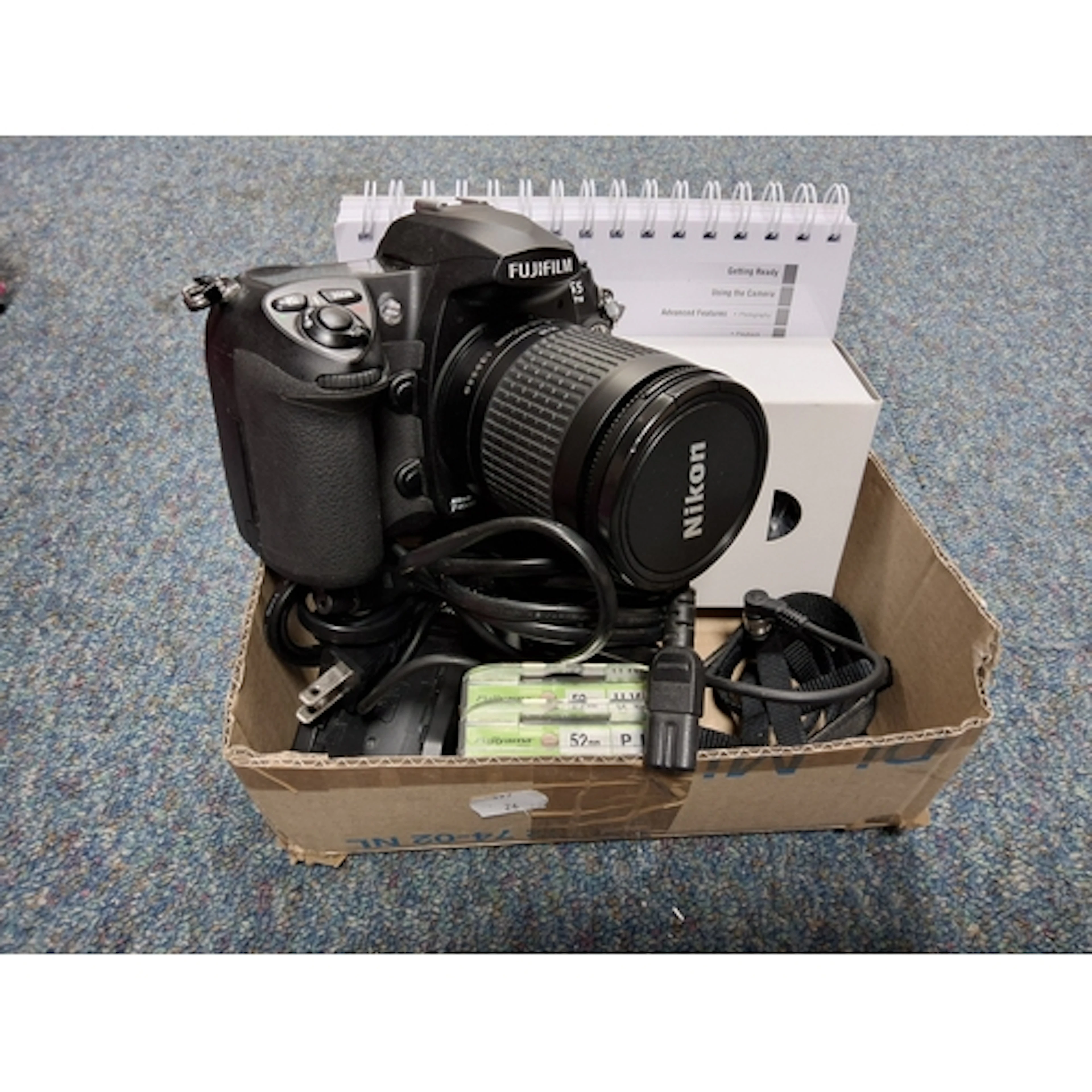 A FUJIFILM FINEPIX S5 PRO CAMERA fitted with a Nikkor AF 28-...