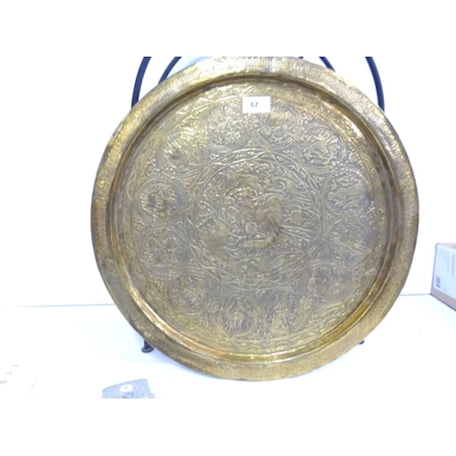 Middle Eastern benares brass tray and a small wine rack.