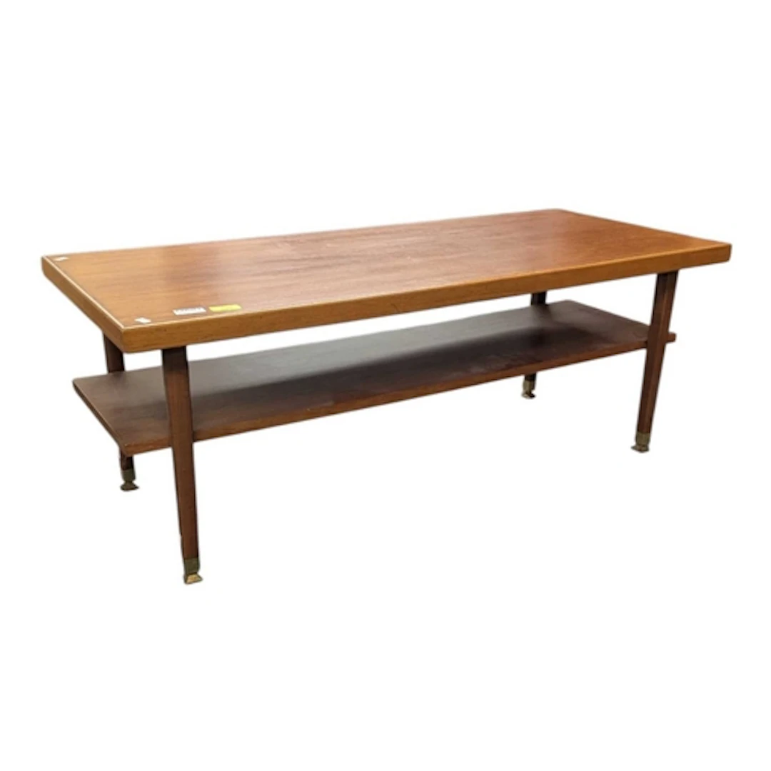 A mid 20th century teak two-tier coffee table or low table. ...