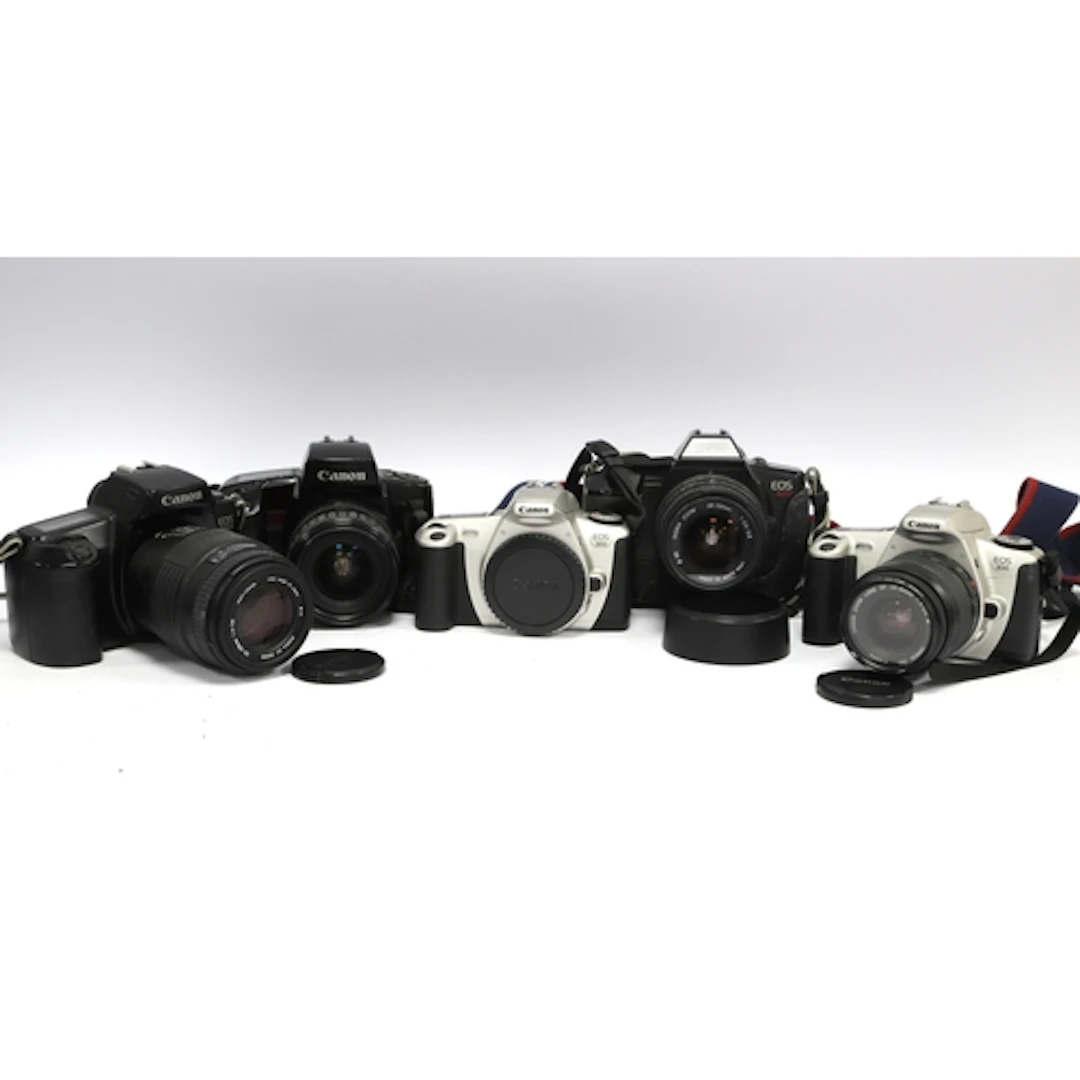 Canon EOS 35mm SLR Film Cameras to include 620 with attached...
