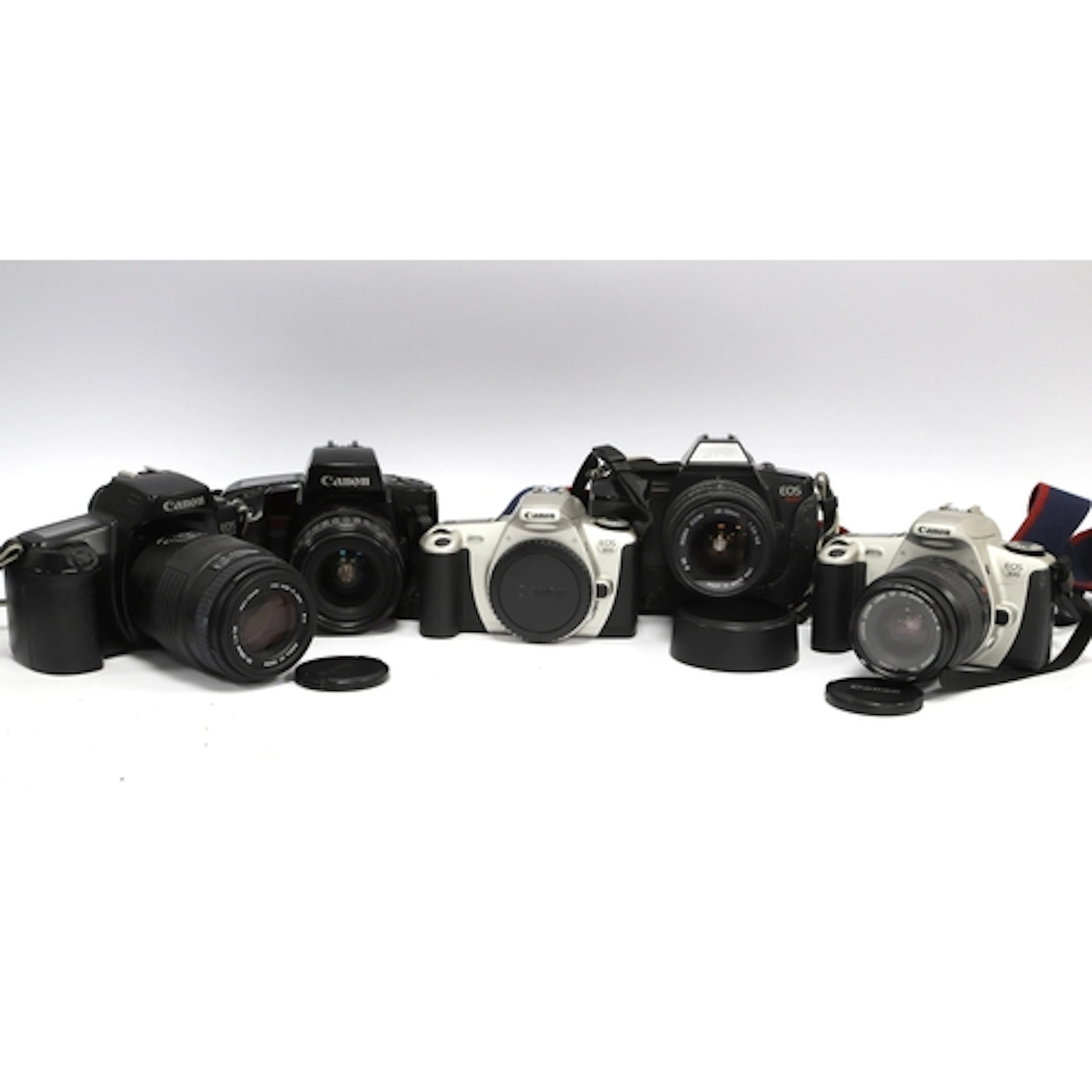Canon EOS 35mm SLR Film Cameras to include 620 with attached...