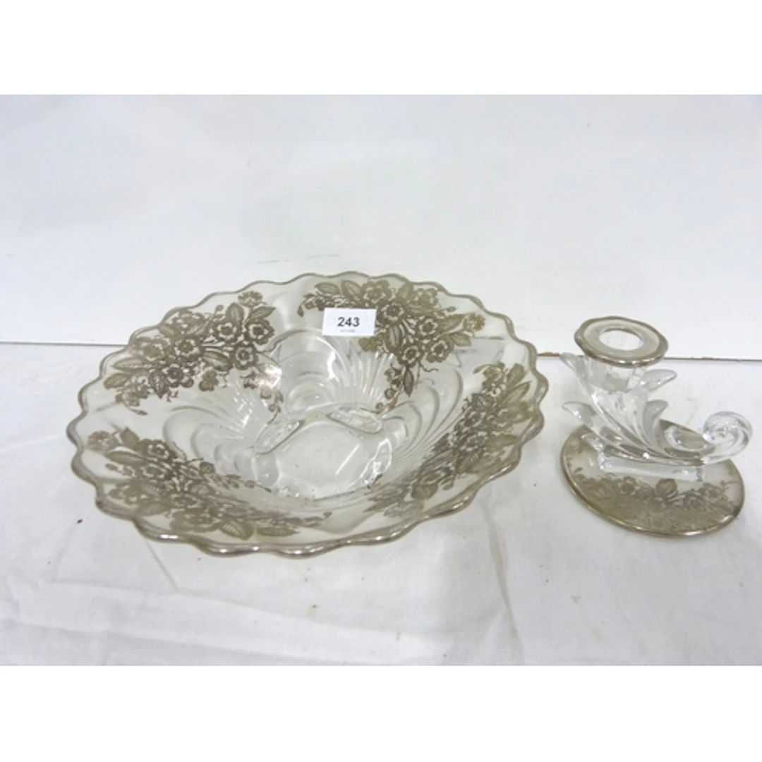 Glass bowl overlaid with silver and a similar candlestick. (...