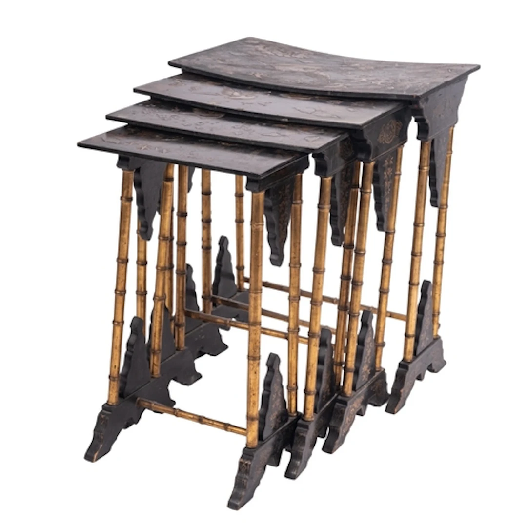 A Victorian quartetto nest of lacquered and parcel gilt papi...