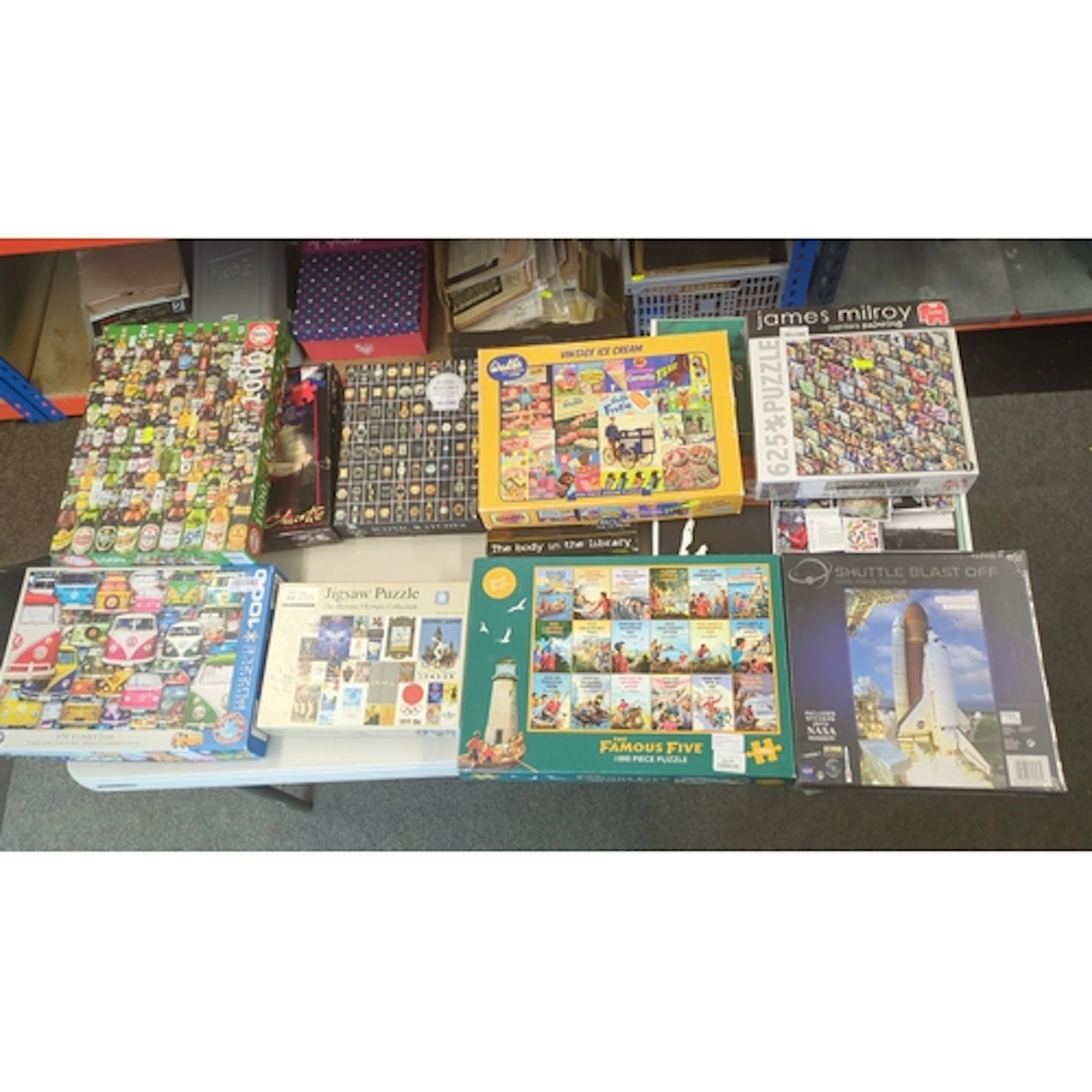 A group of boxed jigsaw puzzles, mainly 1000-piece, includin...
