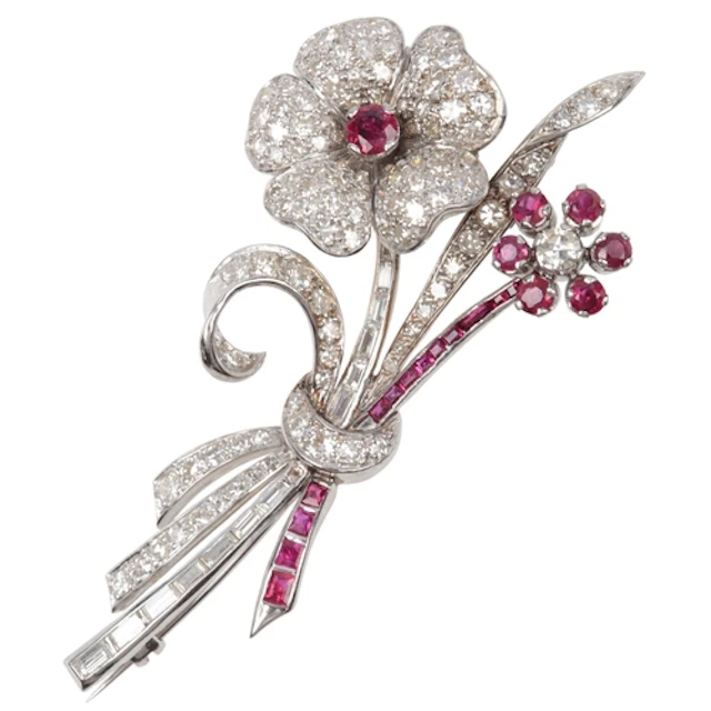 A ruby and diamond brooch, circa 1960, designed as a posy of...