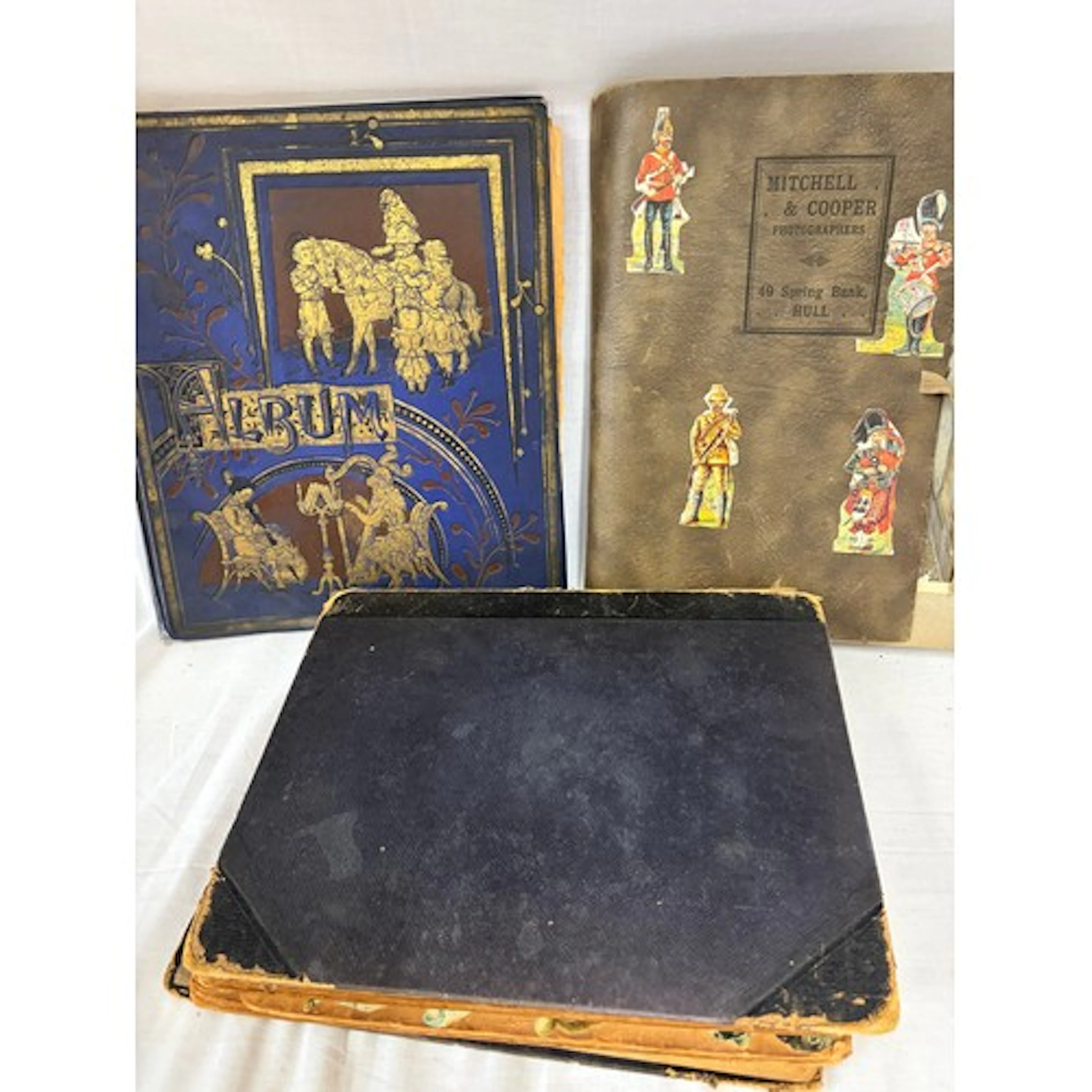 A pair of Victorian scrapbooks full of decoupage, cuttings, ...