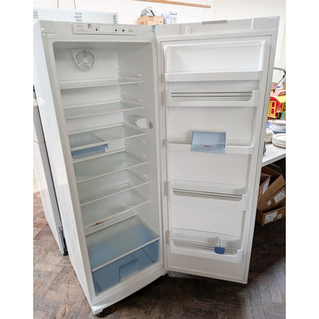 A Bosch single door fridge fitted interior drawer and shelve...