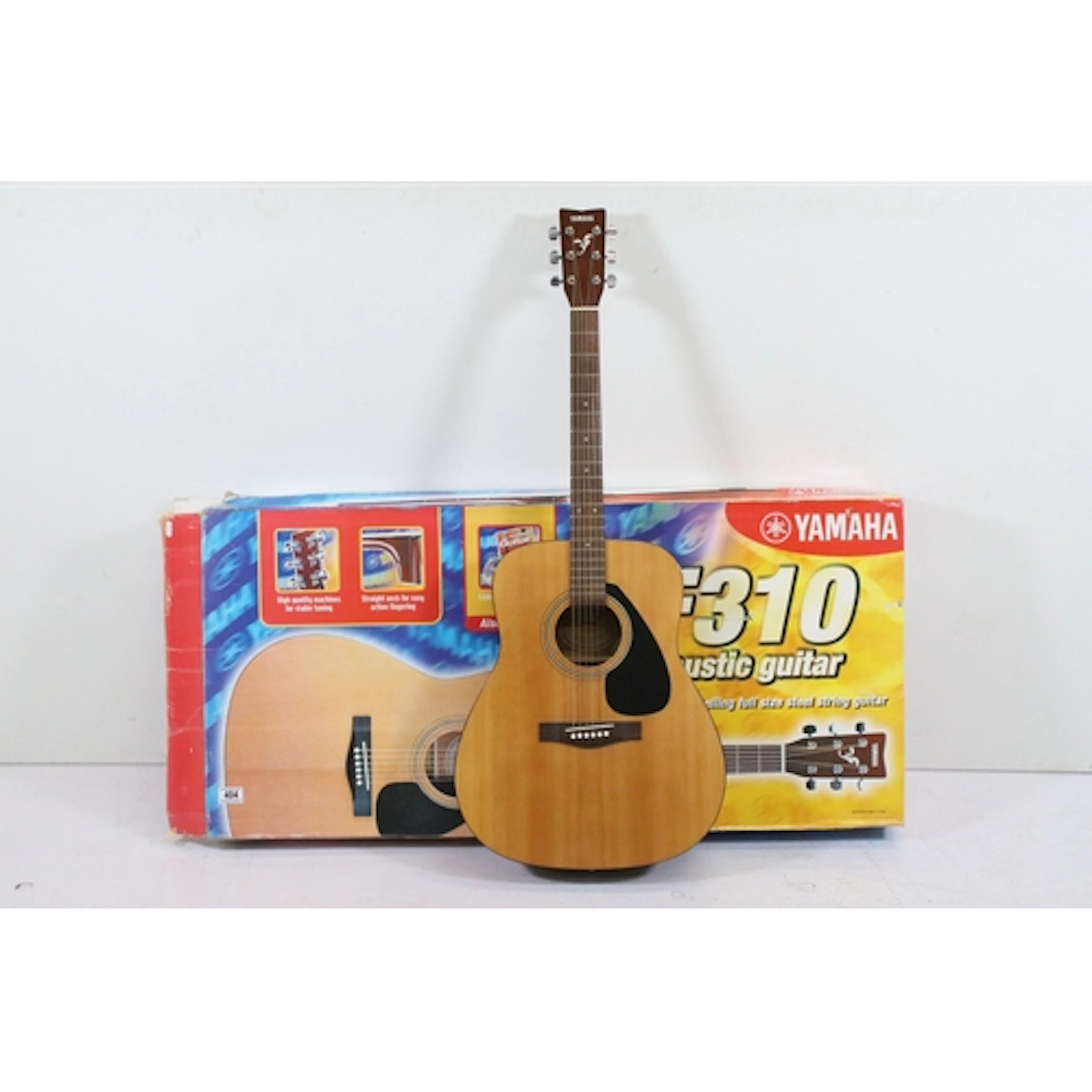 Yamaha F310 acoustic guitar, within original box