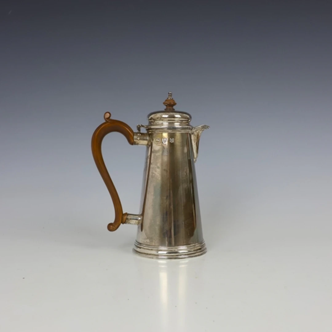 A late 20th century silver hot water jug, Lowe & Sons, Chest...