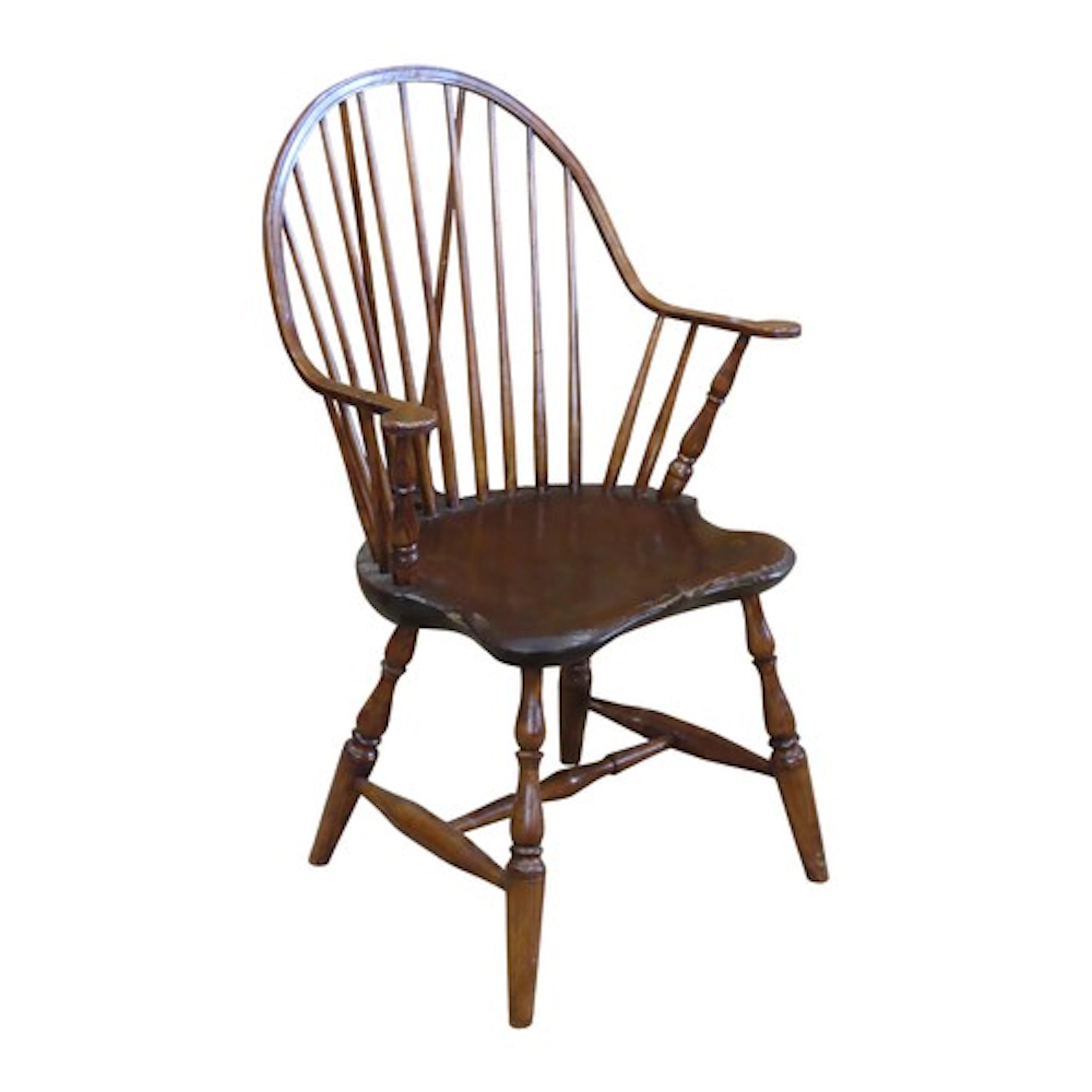 A Windsor stickback chair in the American style on turned su...