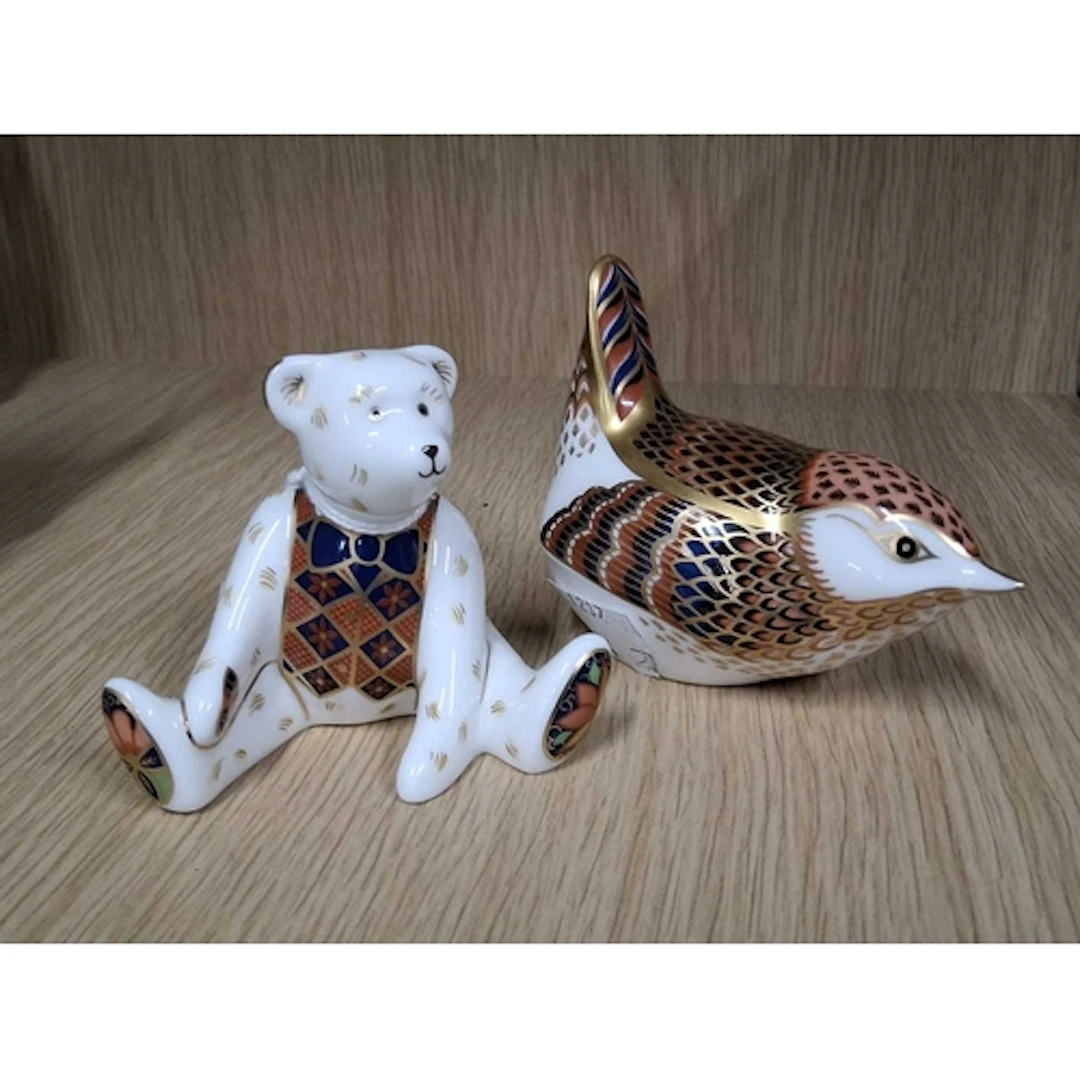A ROYAL CROWN DERBY PAPERWEIGHT AND MINIATURE TEDDIES FIGURE...