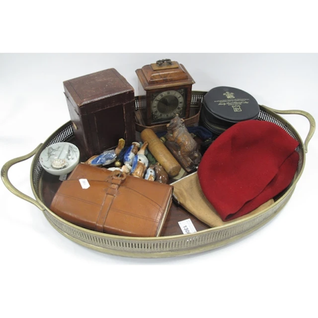 A Large Oval Wooden Tray with plated gallery edge and centra...