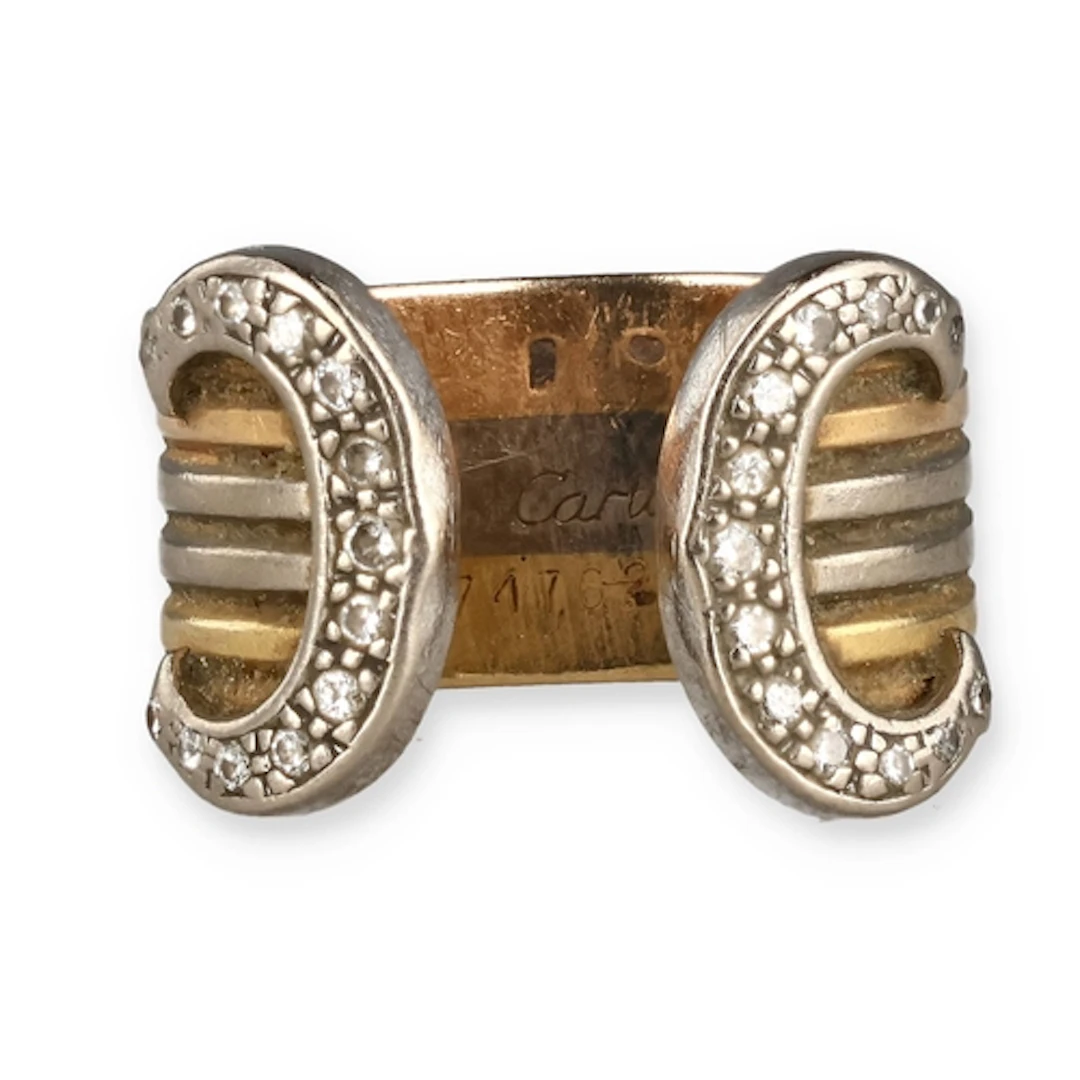 A CARTIER 18CT GOLD DIAMOND RING With three colour gold band...