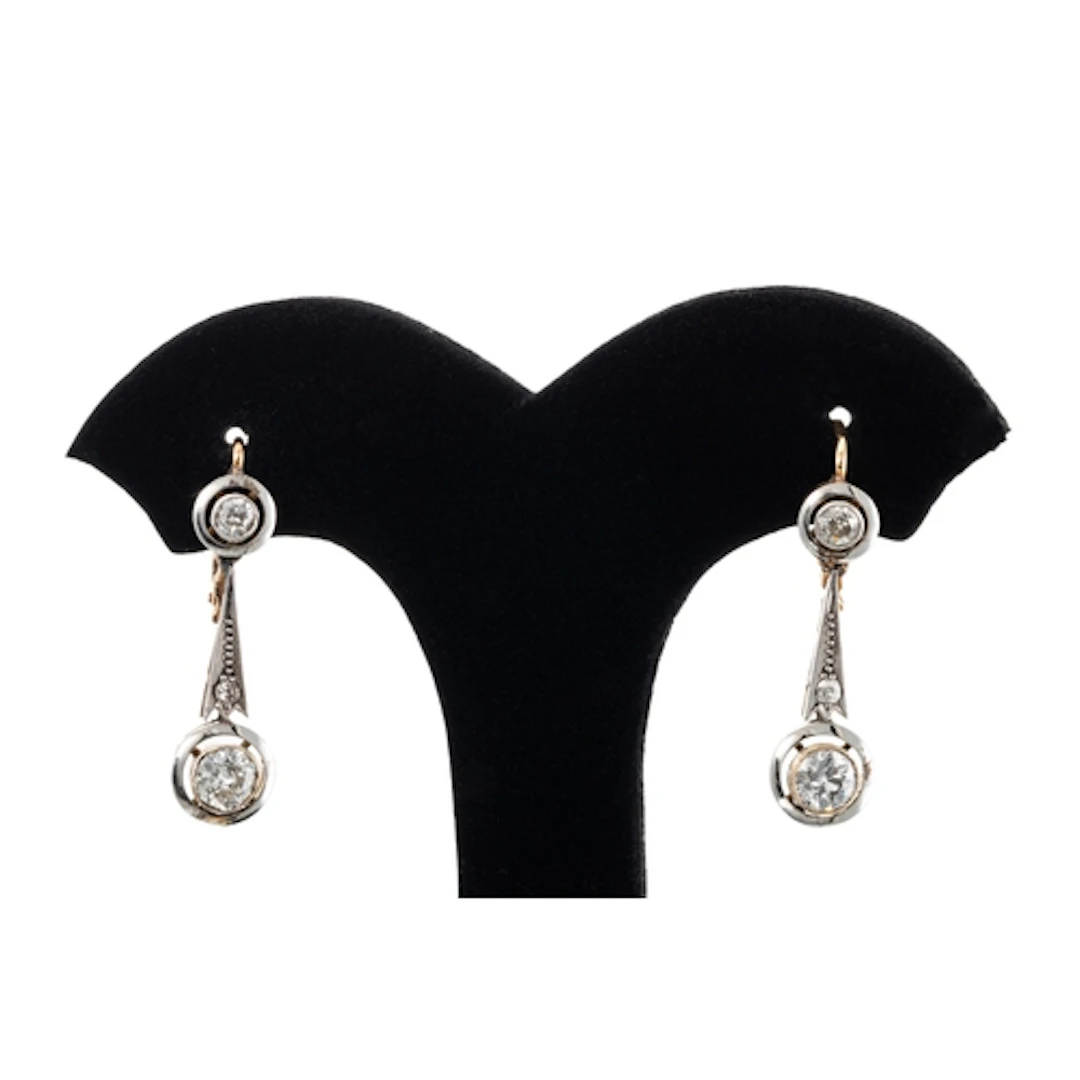 A PAIR OF VINTAGE DIAMOND DROP EARRINGS, the old cut diamond...