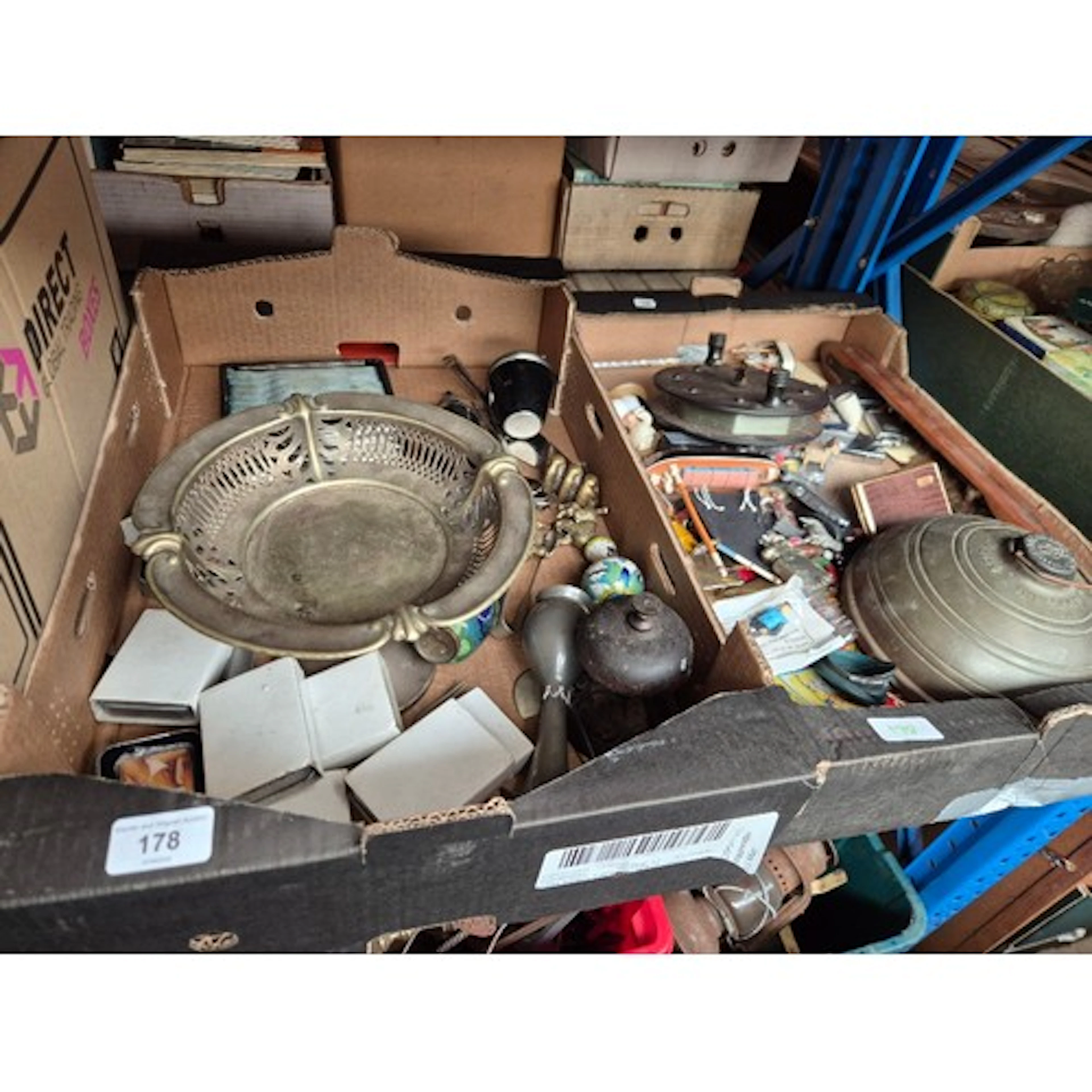 2 boxes of assorted collectables to include cigarette lighte...