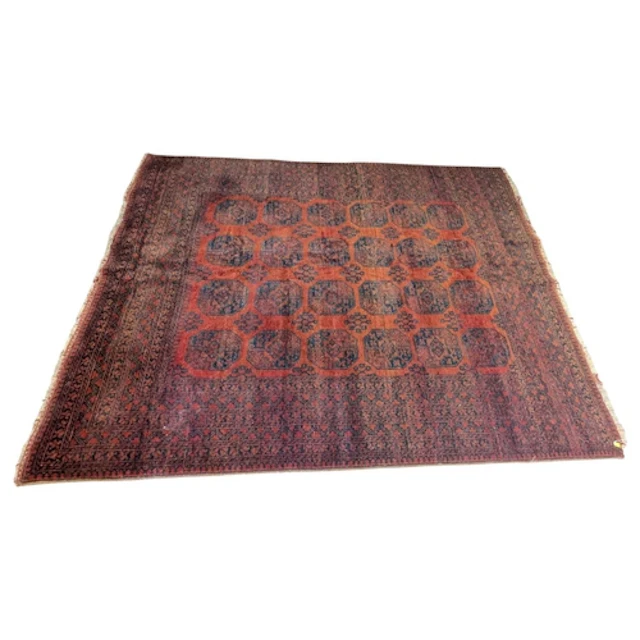 A vintage 20th century Persian Islamic Ersari carpet floor r...