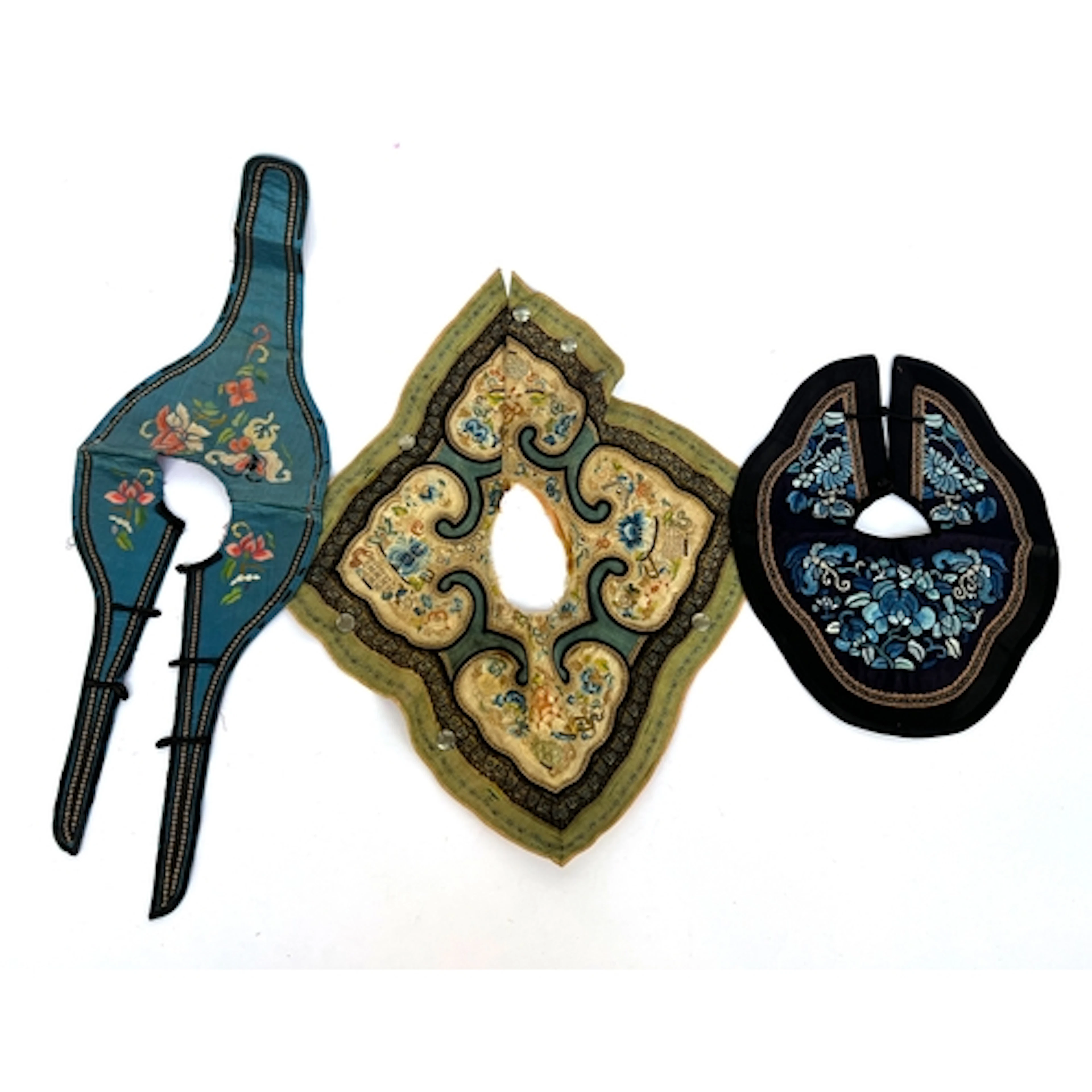 Four antique Chinese silk collars, one pale blue embroidered...