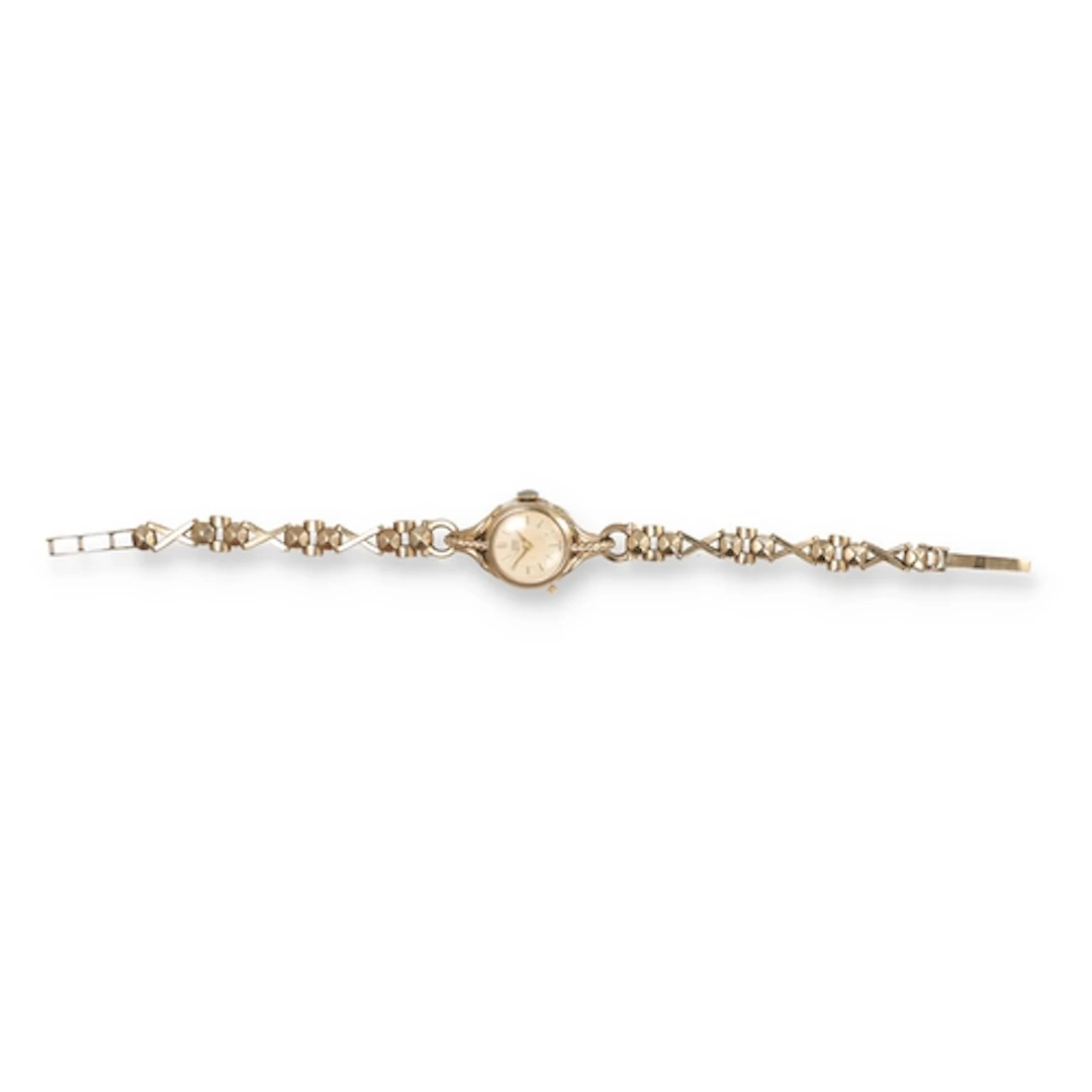 TUDOR ROYAL: A LADIES 9 CARAT GOLD CASED WRIST WATCH, BRACEL...