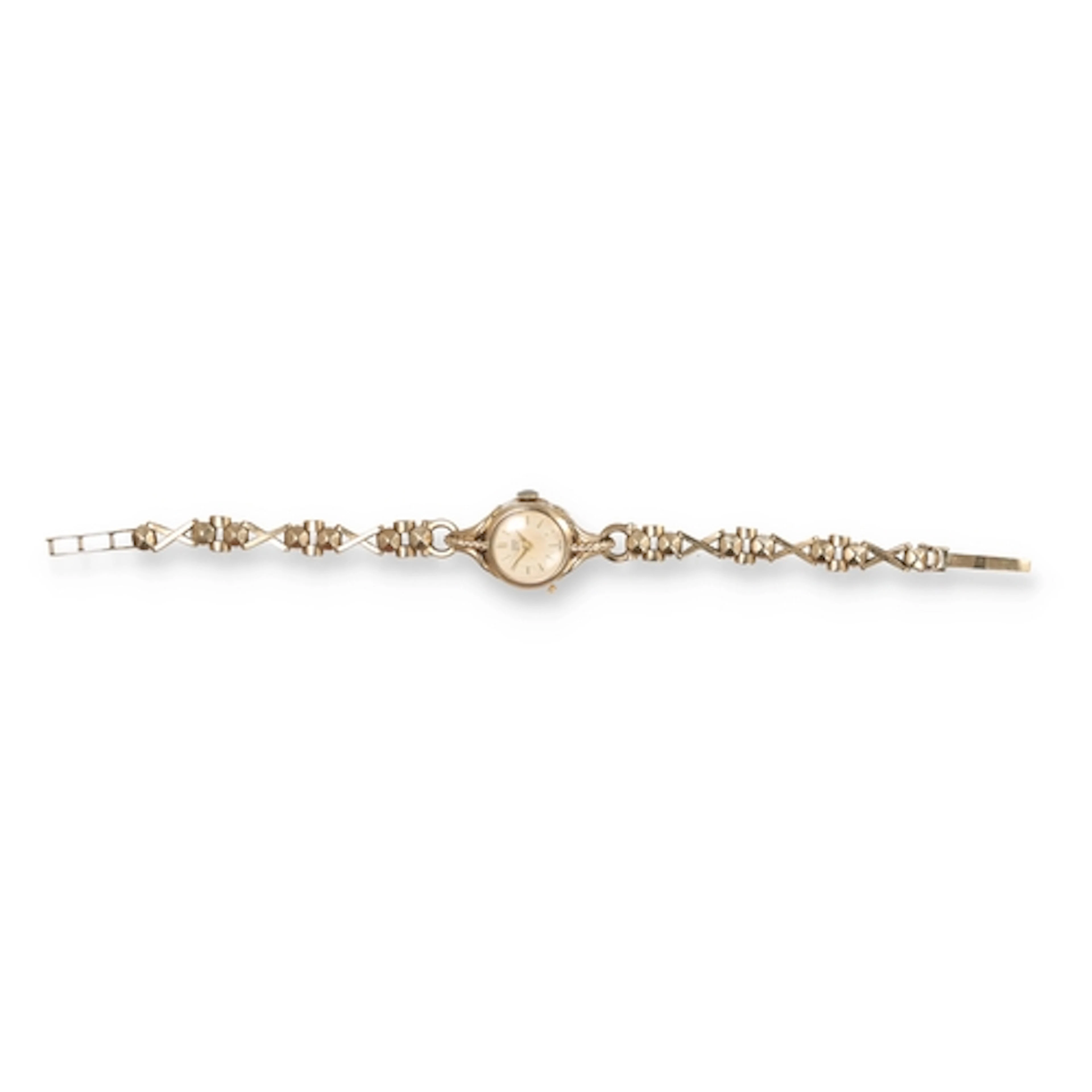 TUDOR ROYAL: A LADIES 9 CARAT GOLD CASED WRIST WATCH, BRACEL...
