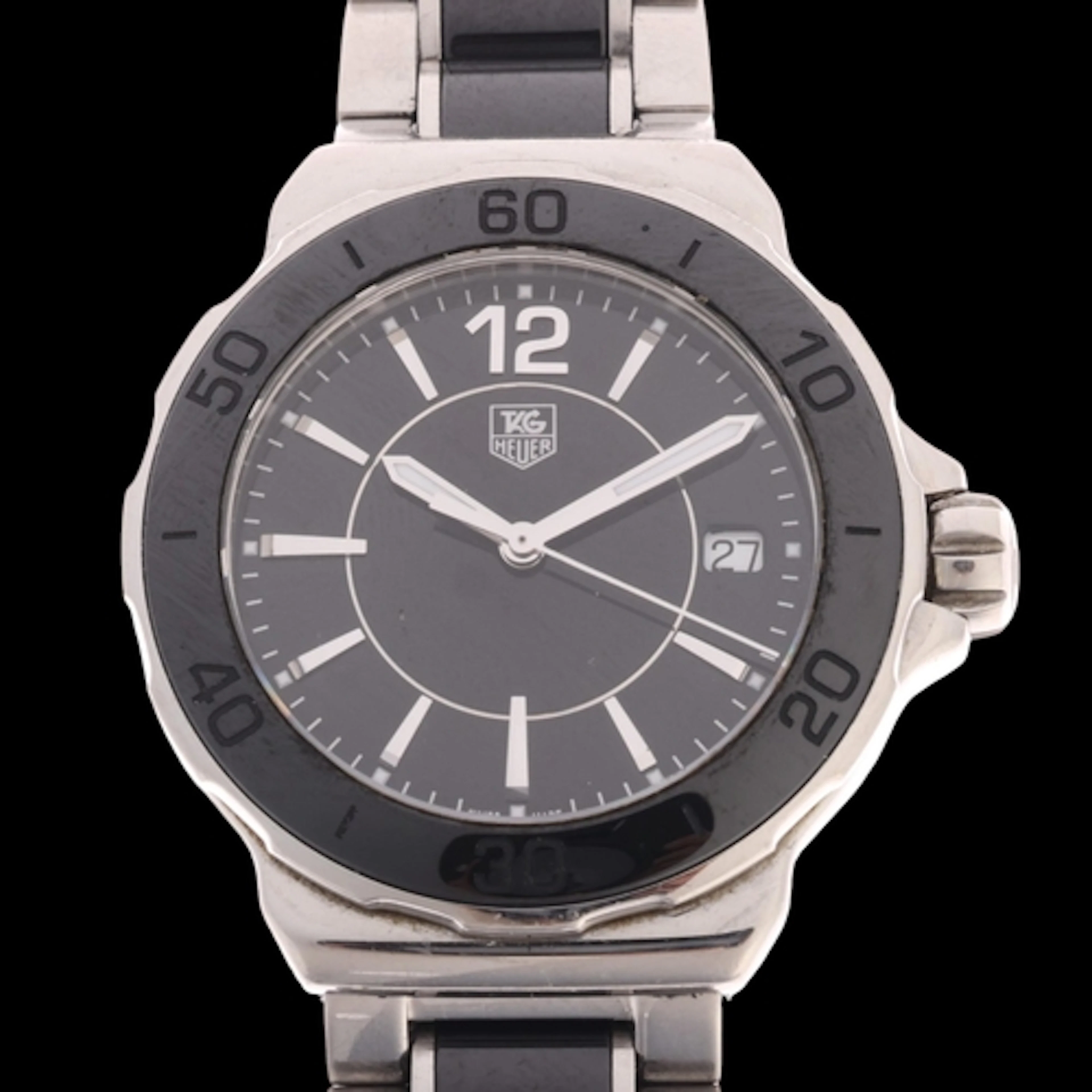 TAG HEUER - a lady's stainless steel and black ceramic Formu...