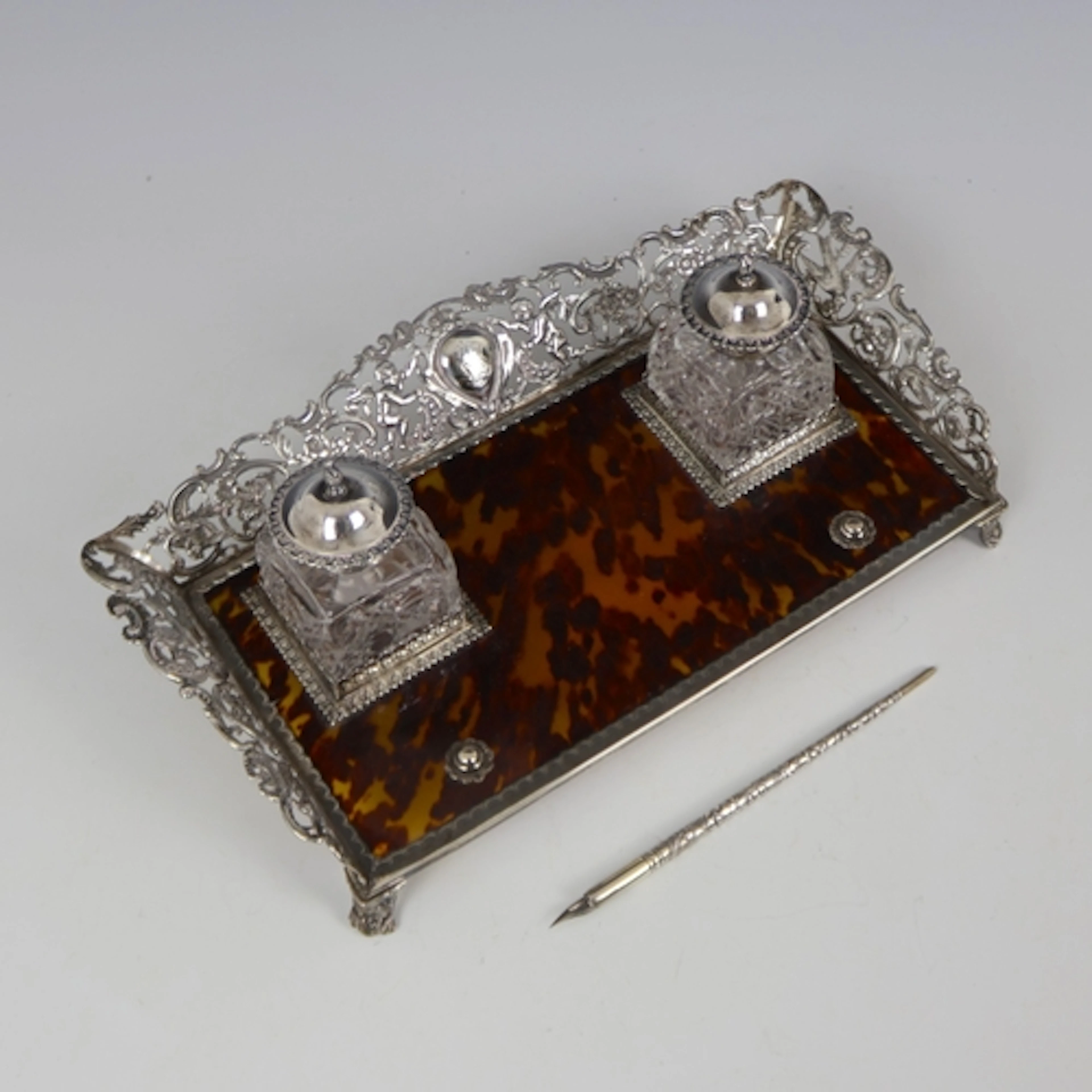 A Victorian silver mounted tortoiseshell desk stand, William...
