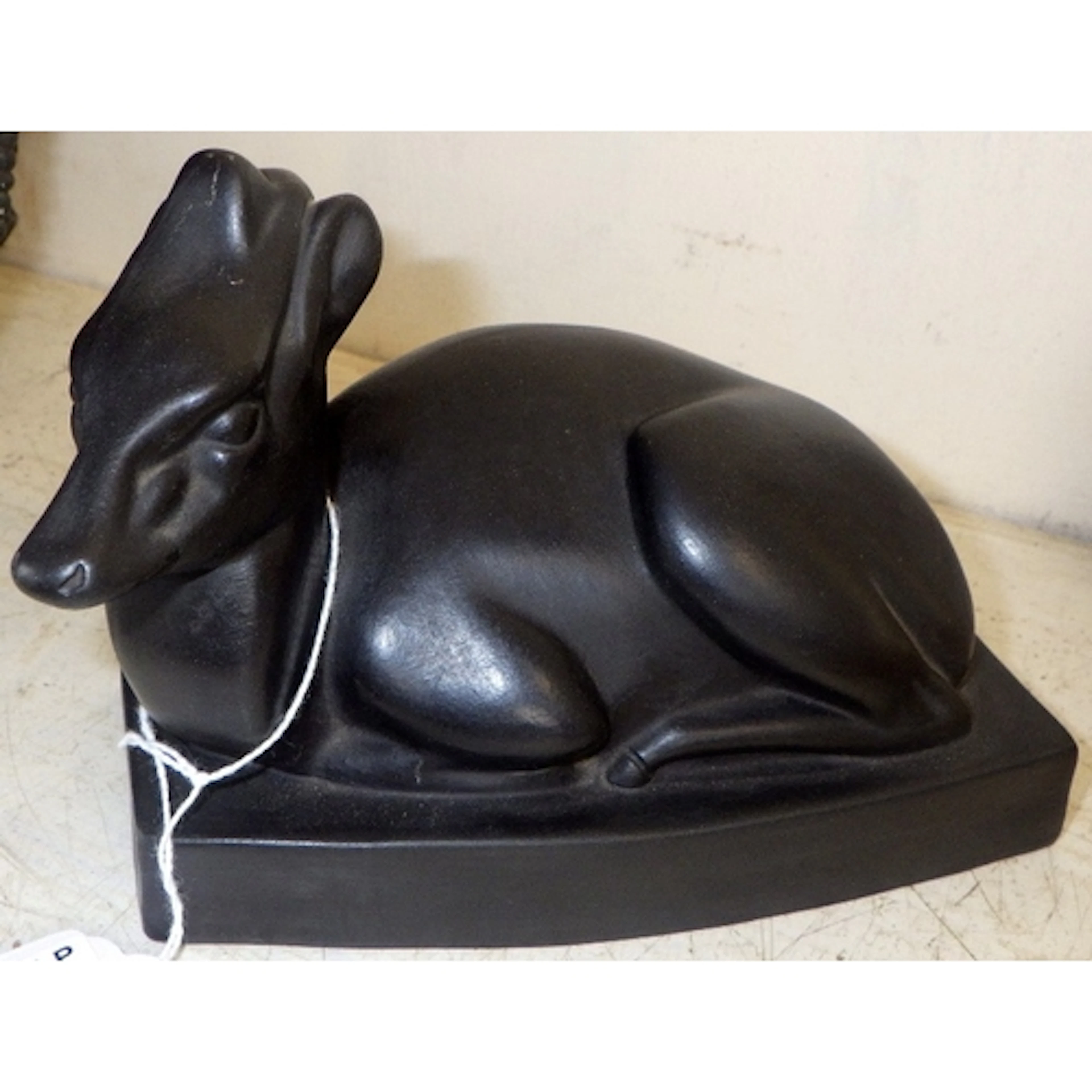 A Wedgwood black basalt Art Deco deer figure, by John Skeapi...