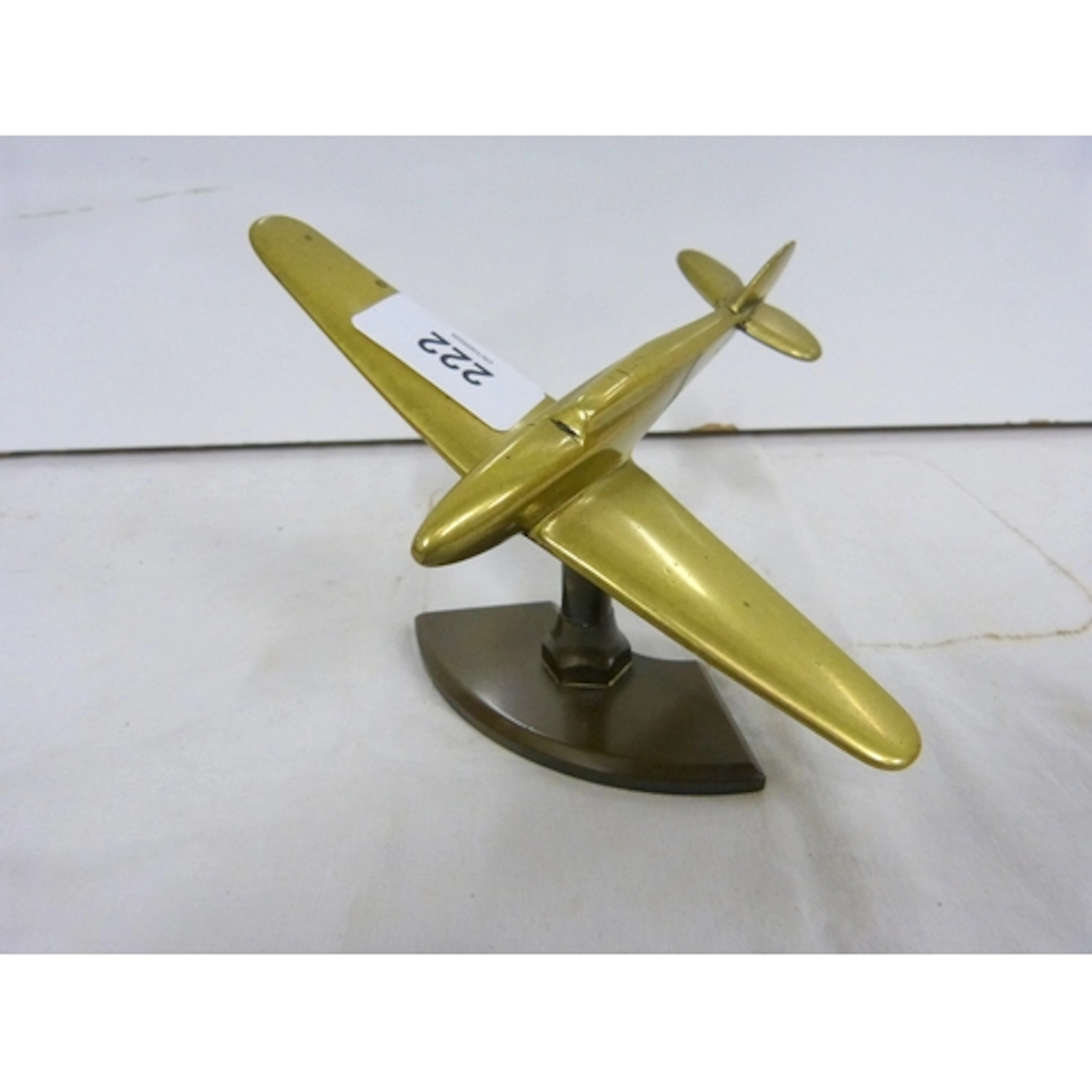 Brass trench art of spitfire desk ornament.