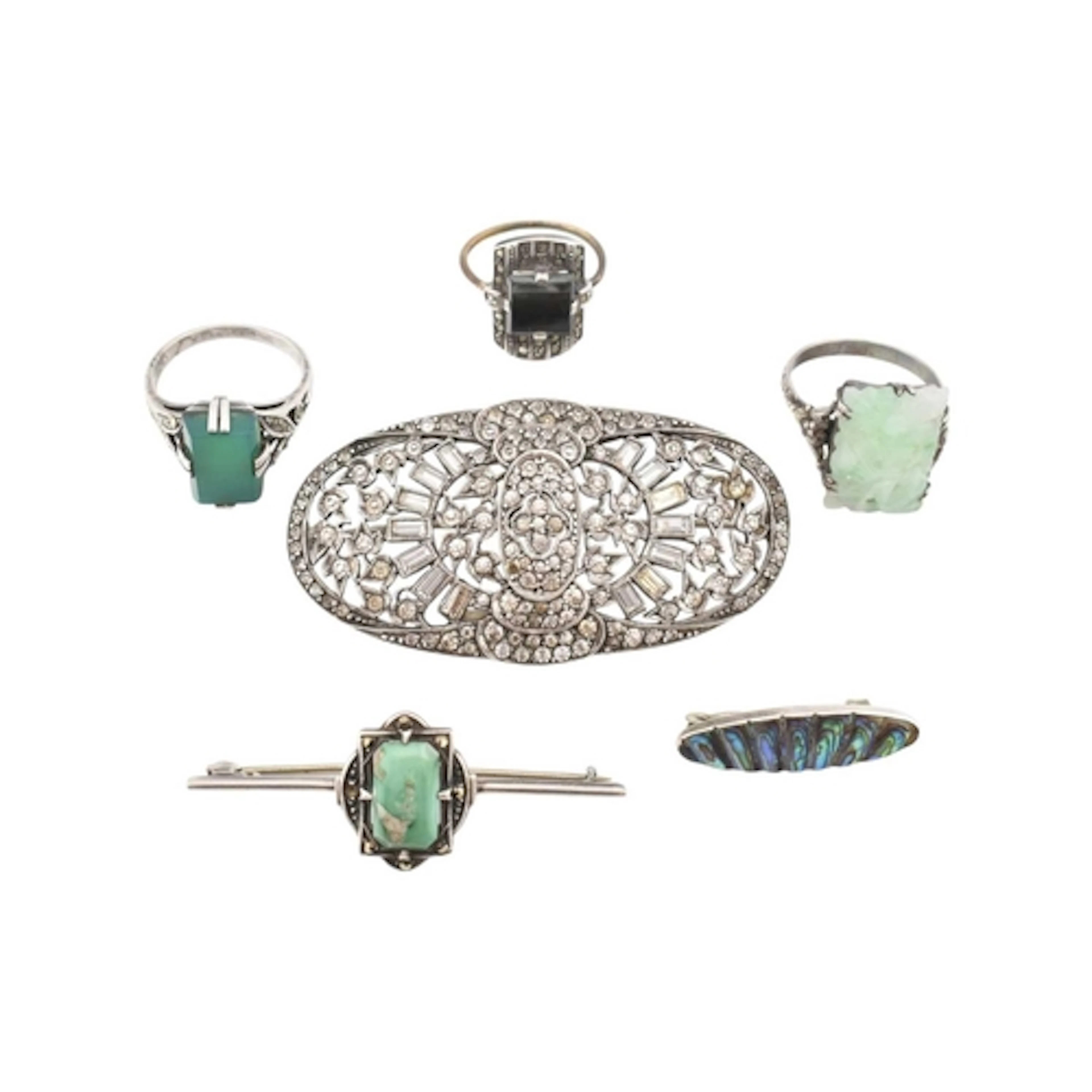 A collection of antique and vintage silver and white metal j...