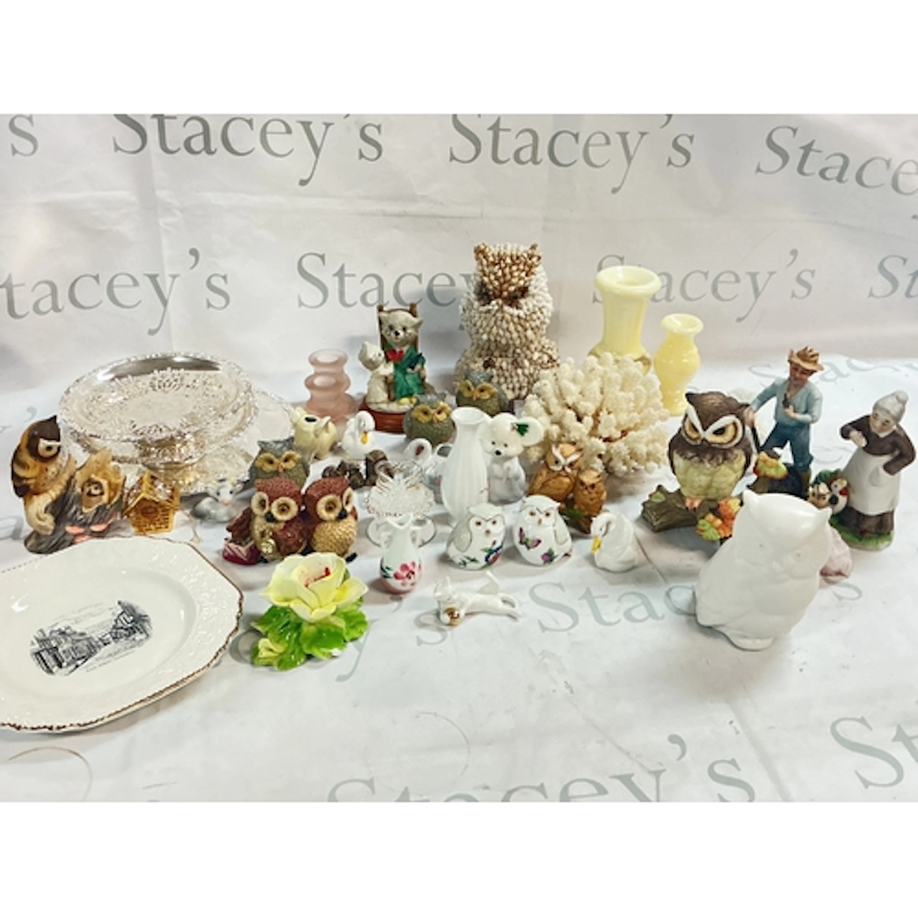 A collection of ceramics including owls, coral, Haworth Brit...