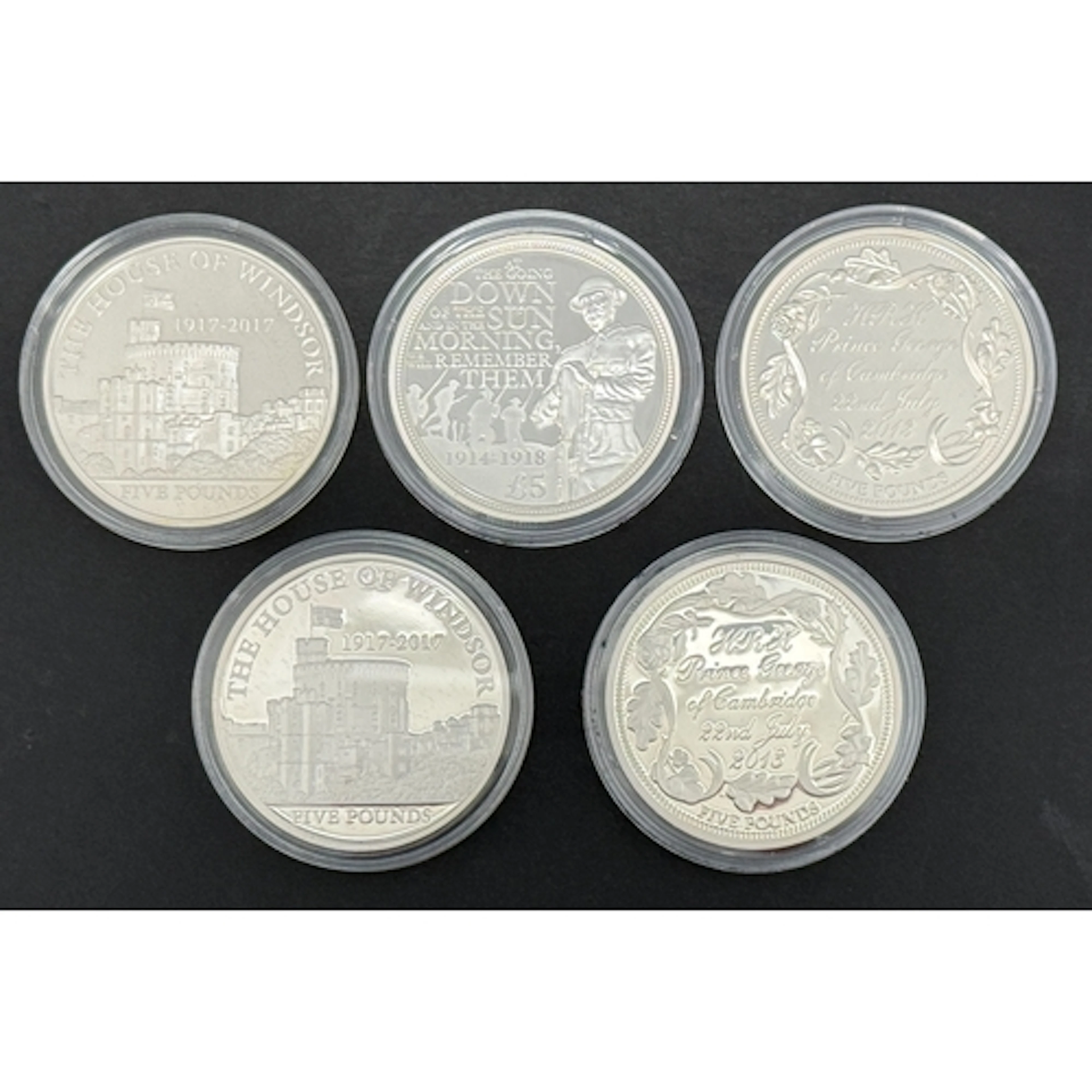 A group of five Guernsey silver proof £5 coins, comprising 2...