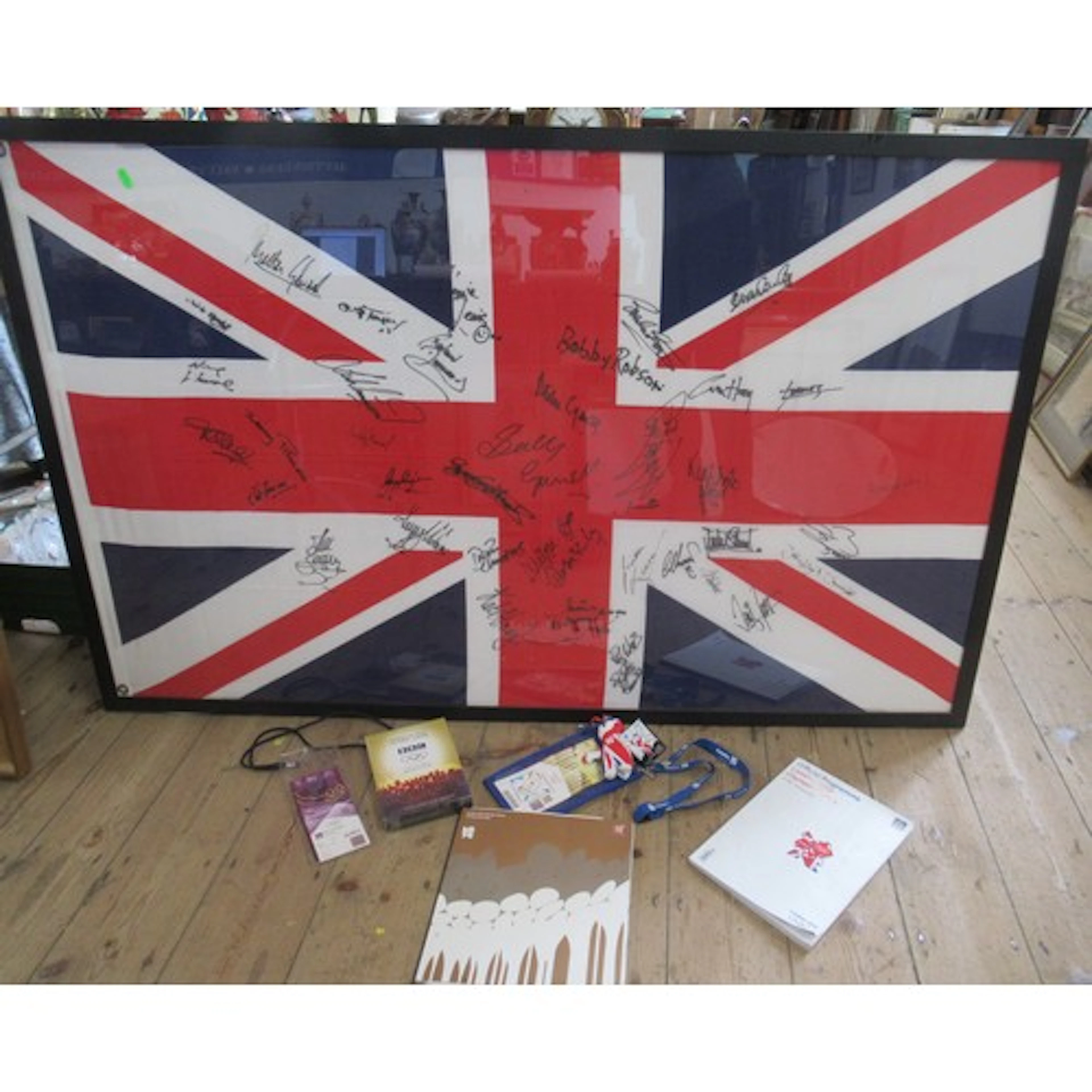 A collection of London 2012 Olympic memorabilia, passes, tic...