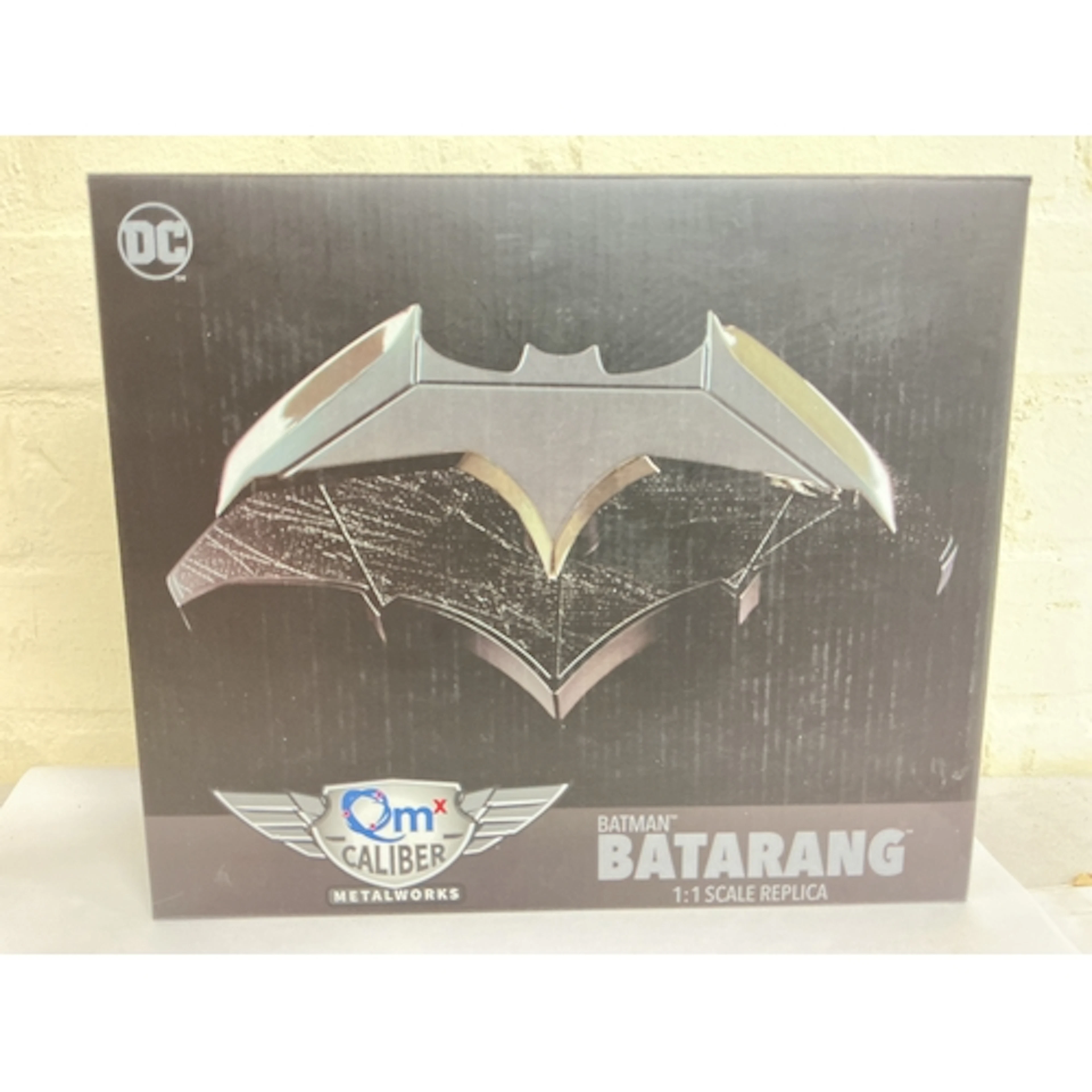 A Boxed Quantum Mechanix Batman Batarang 1/1 Scale Replica.