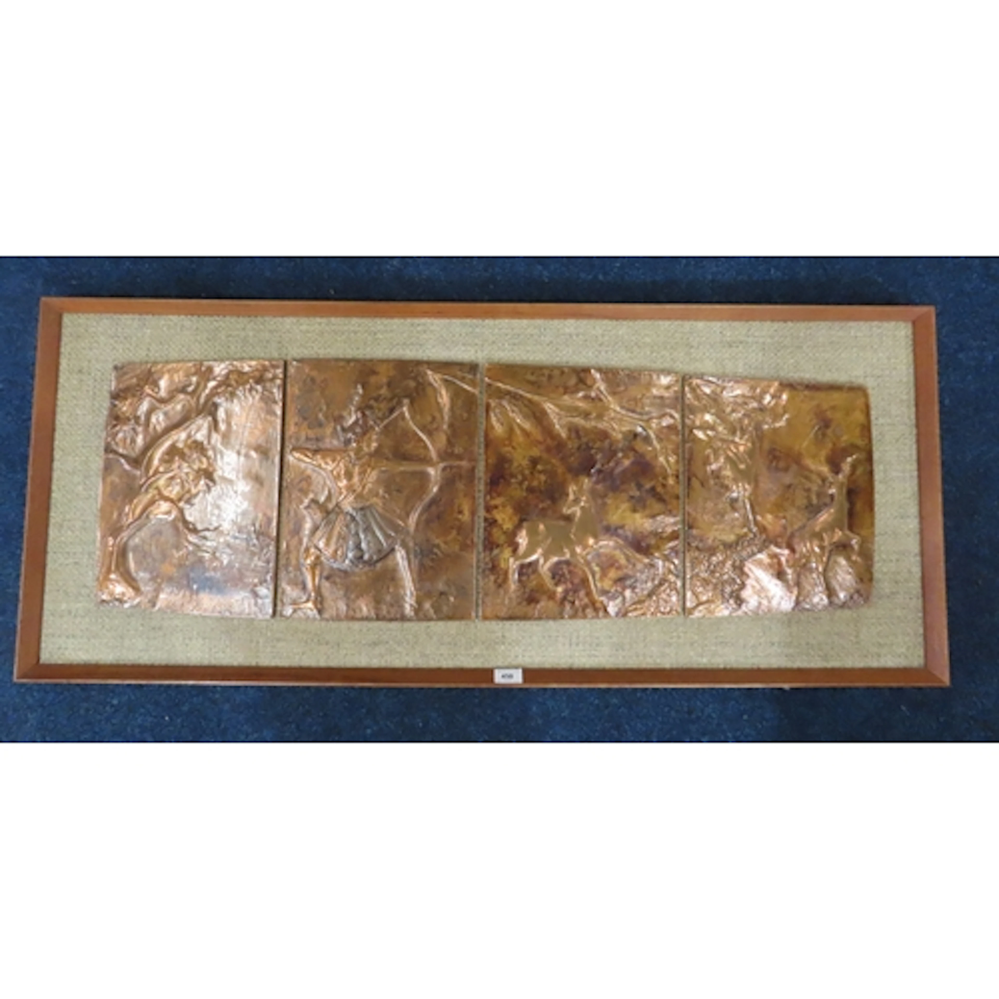 A copper relief panel depicting a hunting scene, 128 x 54cm,...