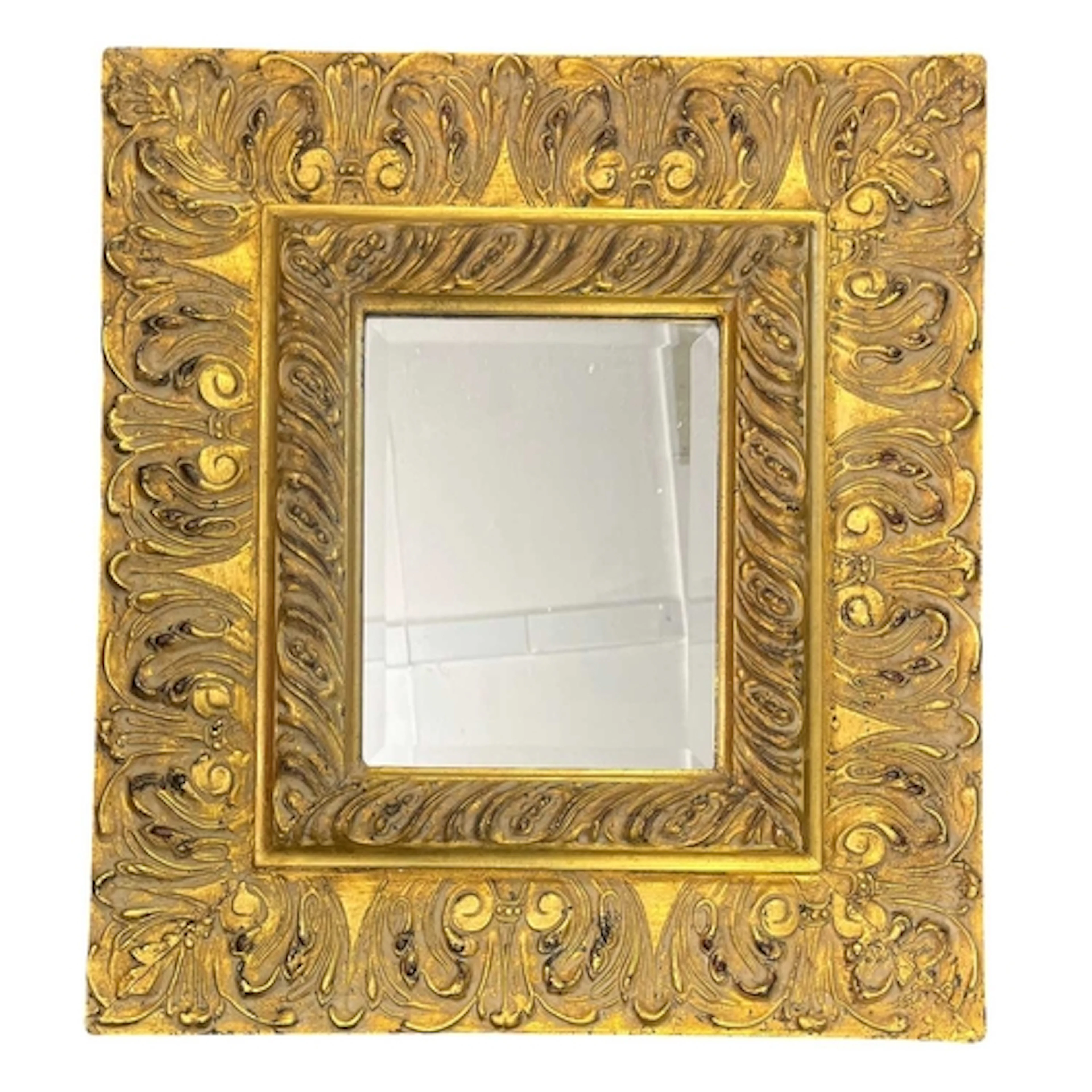 An early to mid 20th century gilt-framed hanging mirror. The...