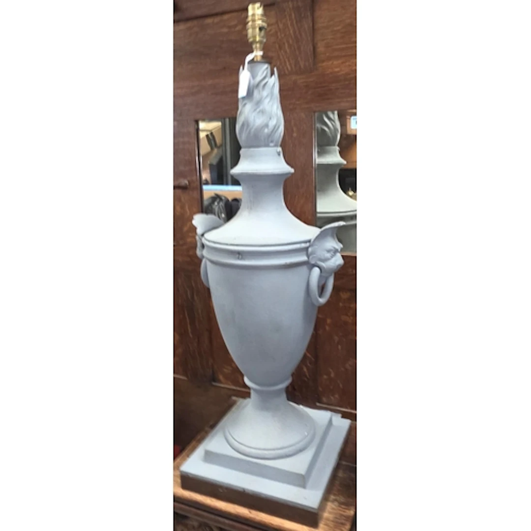 A VINTAGE LAMP BASE, urn shaped, painted cast iron on mahoga...