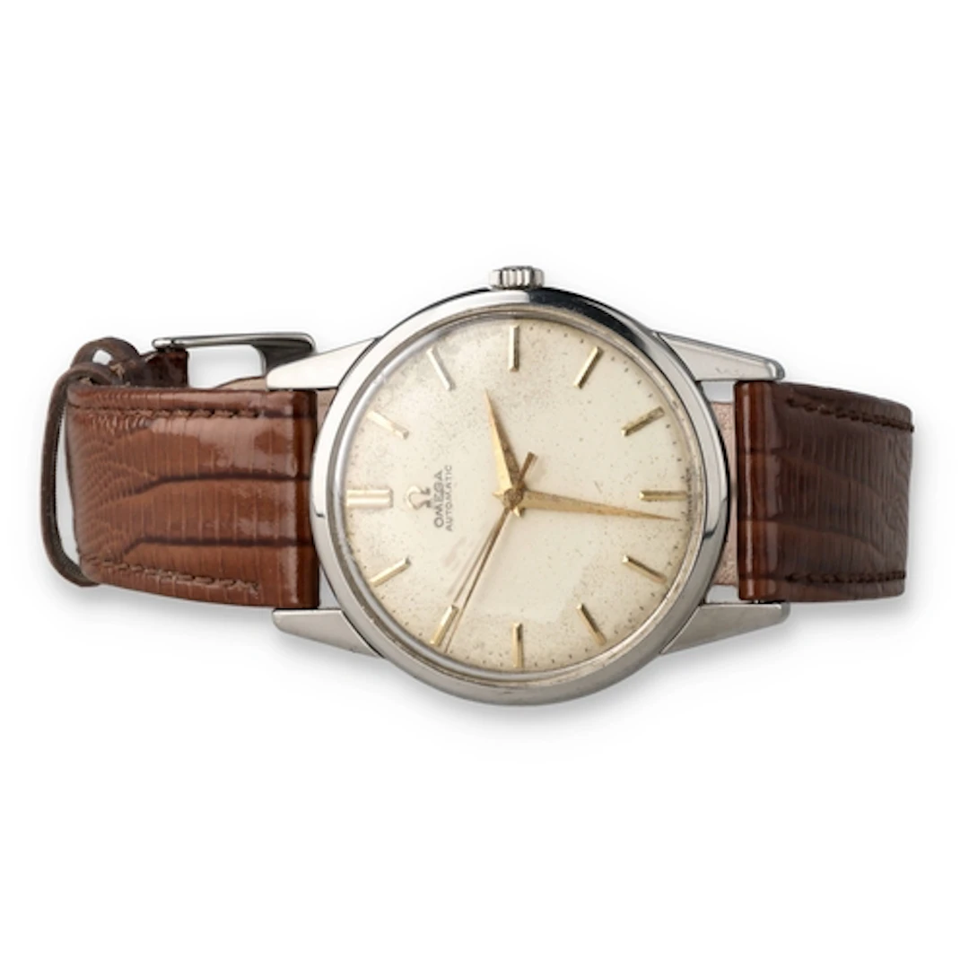 AN OMEGA STEEL AUTOMATIC WATCH